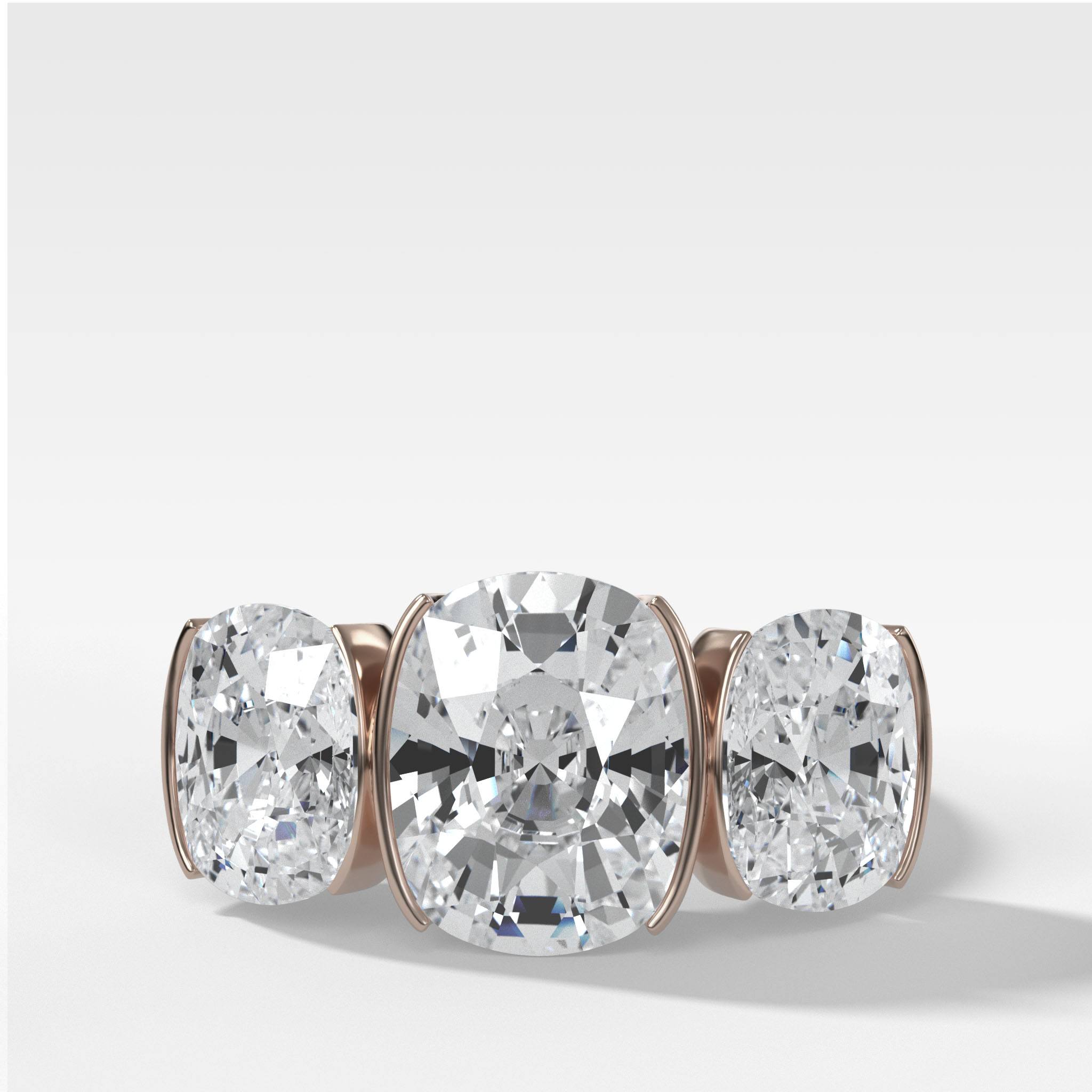 Half Bezel Triad Engagement Ring With Elongated Cushion Cut Diamonds
