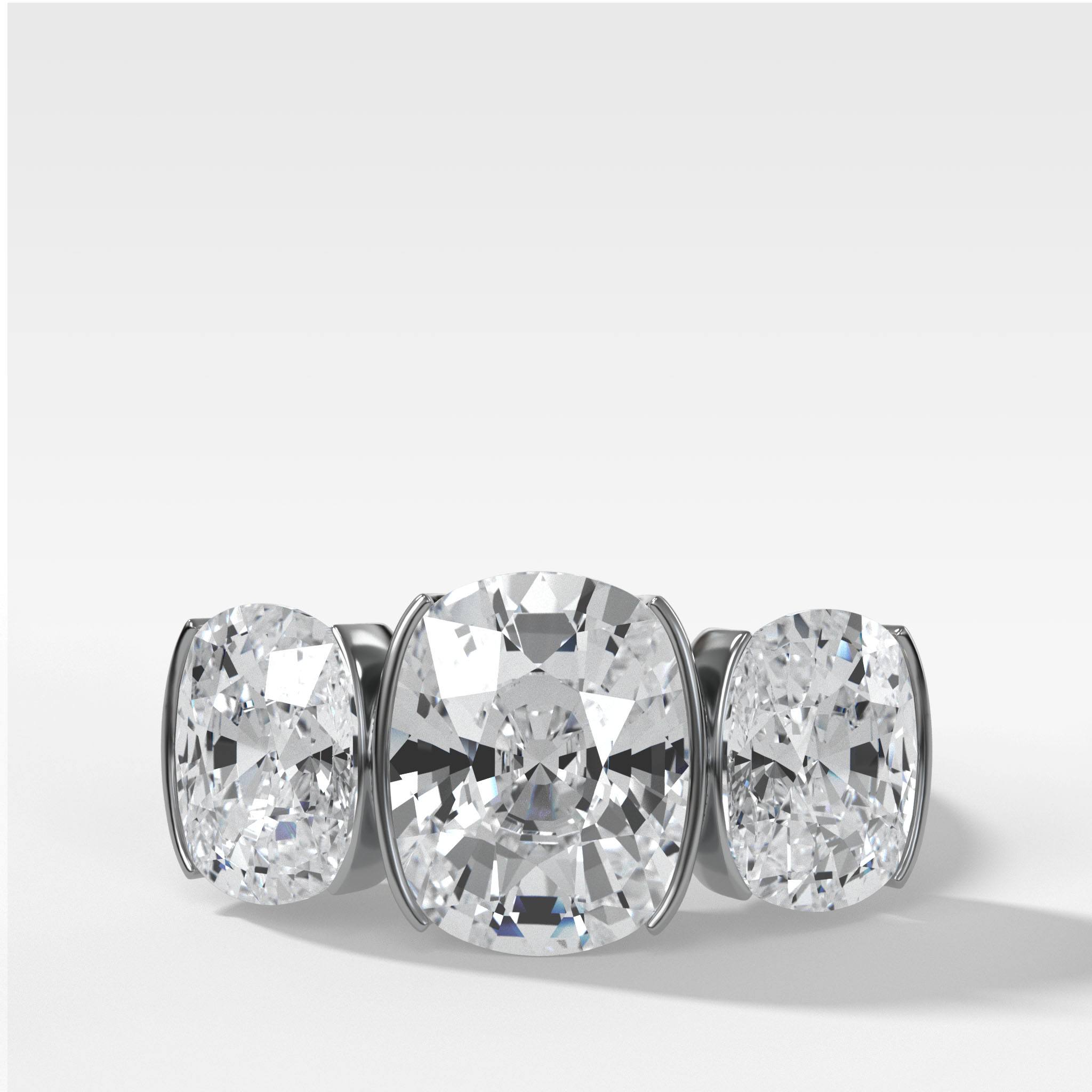 Half Bezel Triad Engagement Ring With Elongated Cushion Cut Diamonds