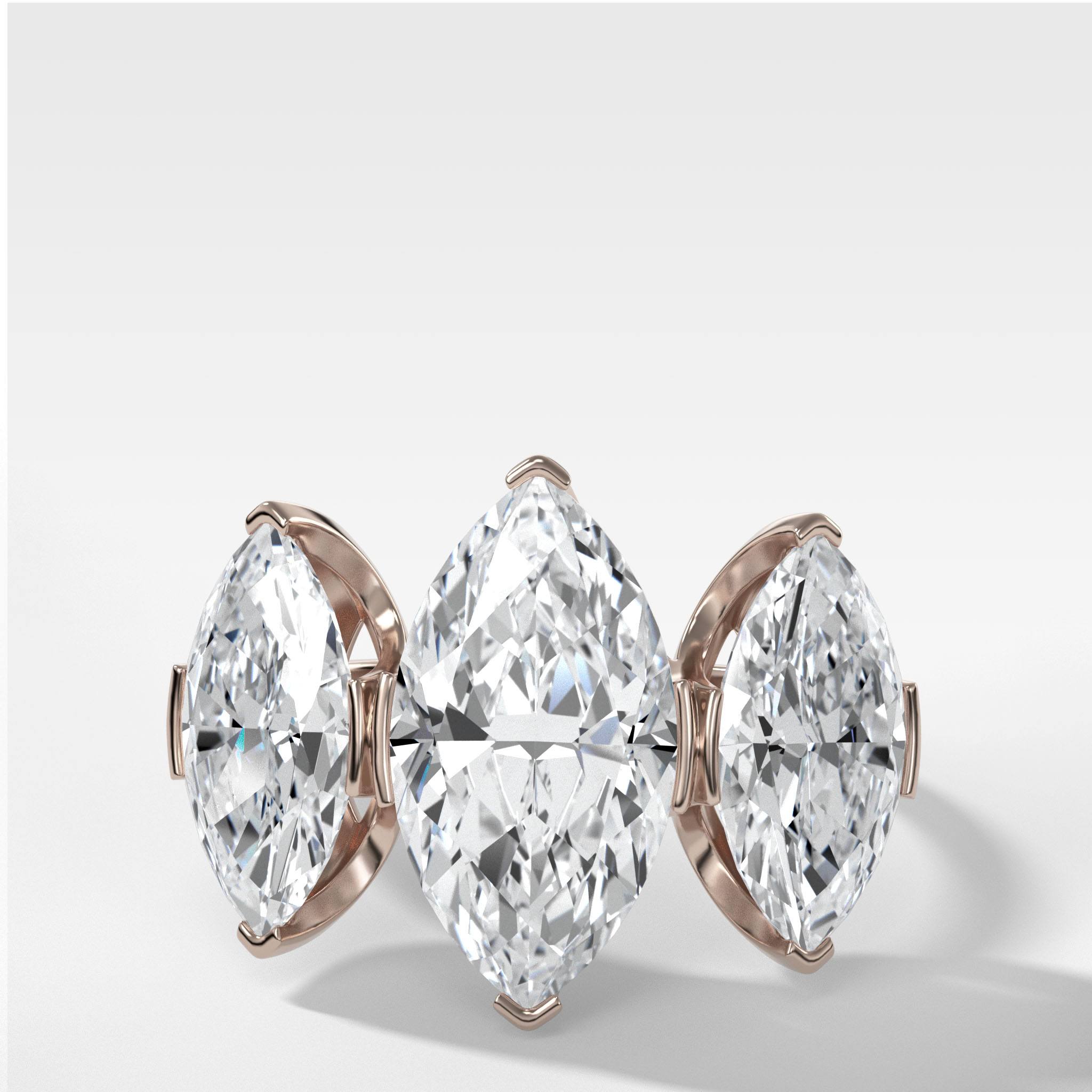 Half Bezel Triad Engagement Ring With Marquise Cut Diamonds