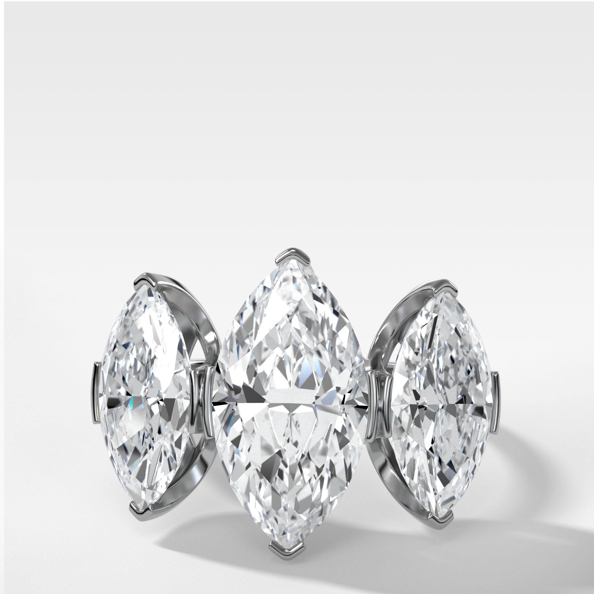 Half Bezel Triad Engagement Ring With Marquise Cut Diamonds