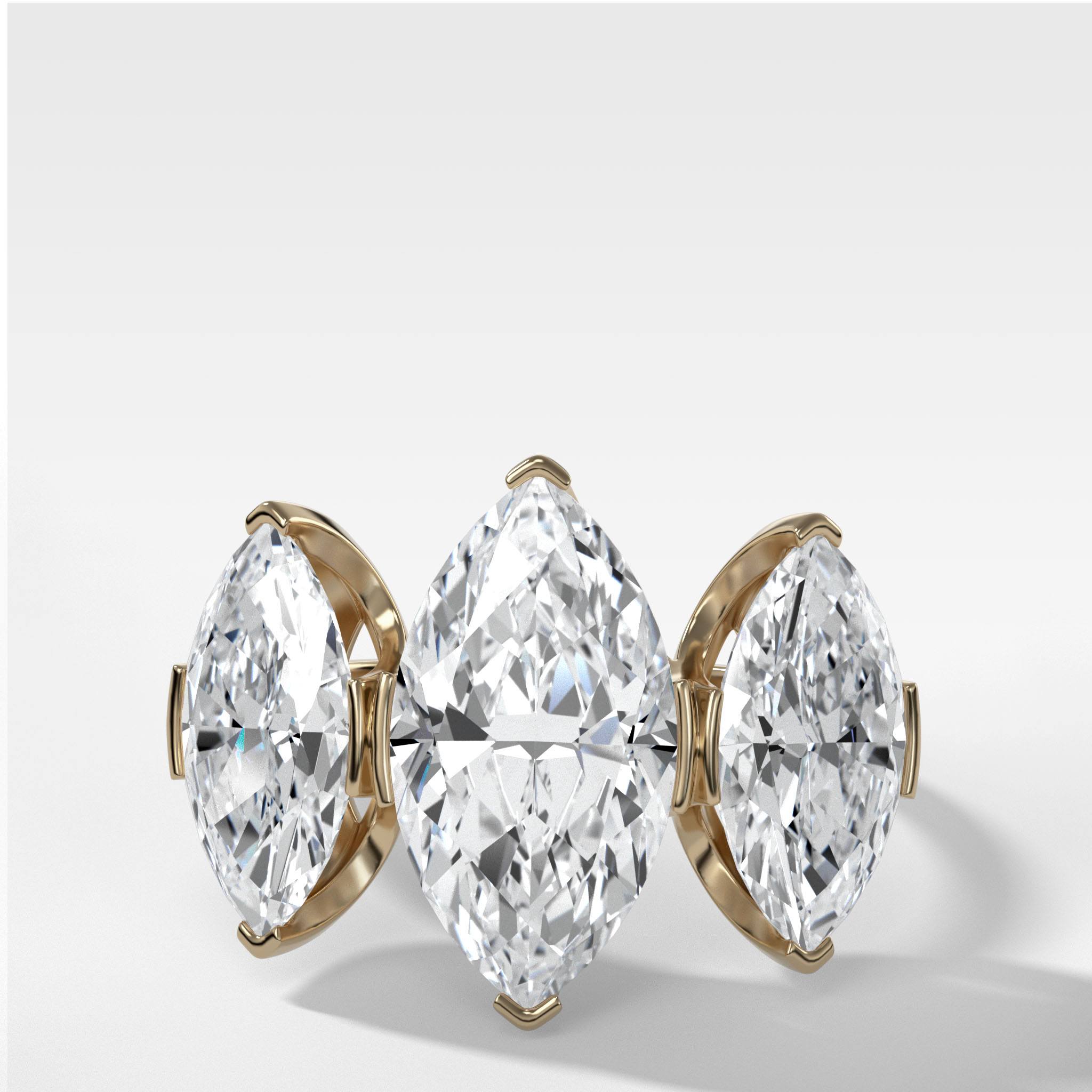 Half Bezel Triad Engagement Ring With Marquise Cut Diamonds