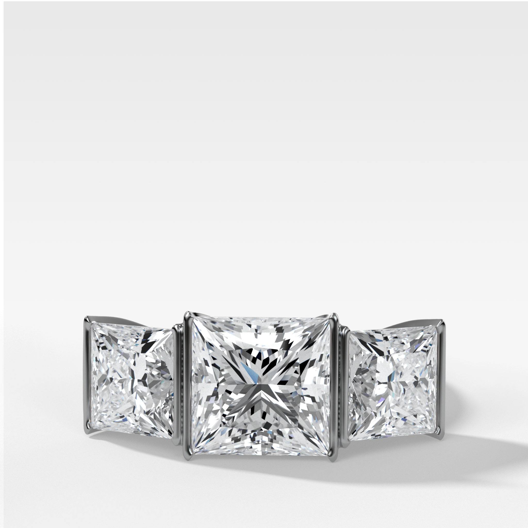 Half Bezel Triad Engagement Ring With Princess Cut Diamonds