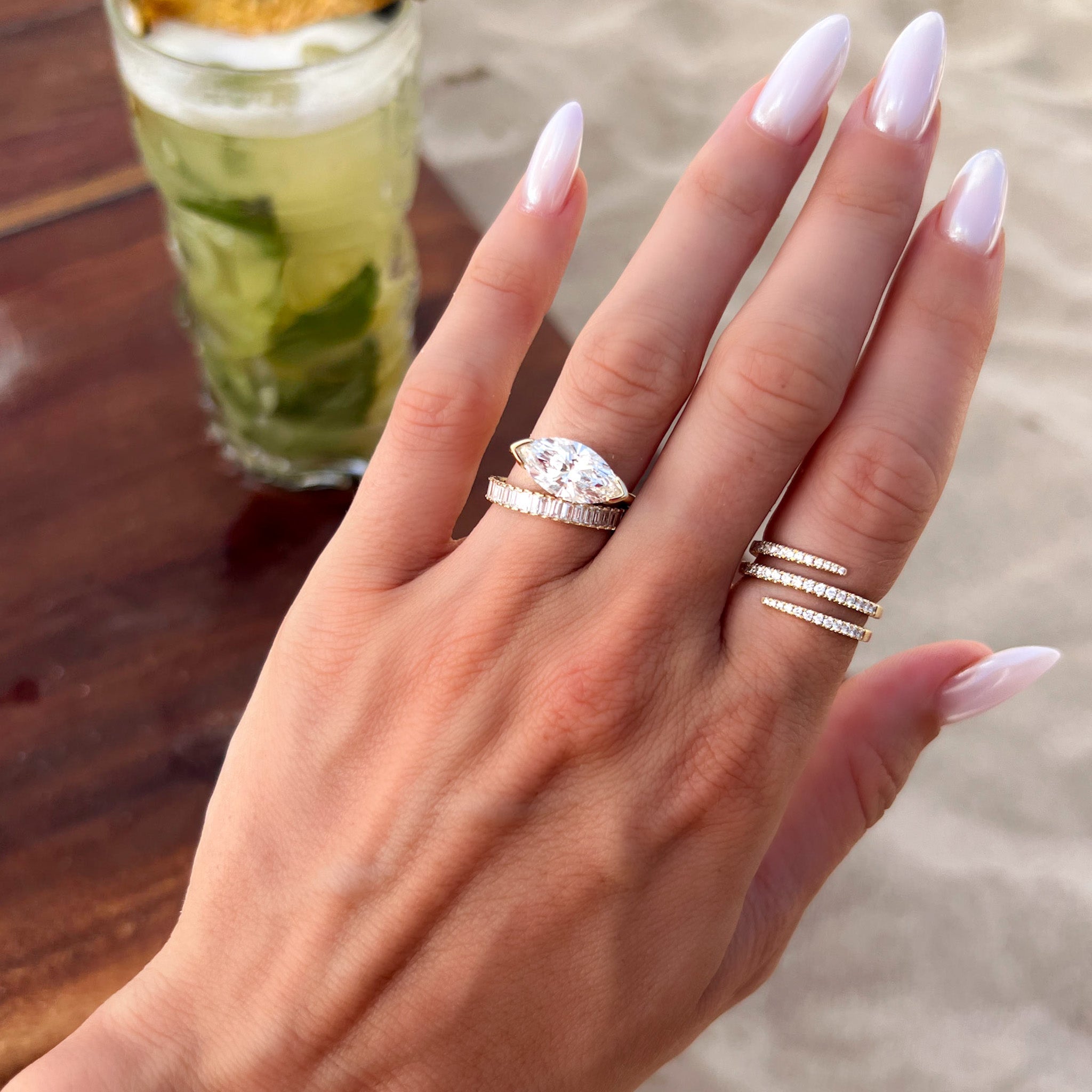 East West Half Bezel Solitaire Engagement Ring With Marquise Cut Diamond