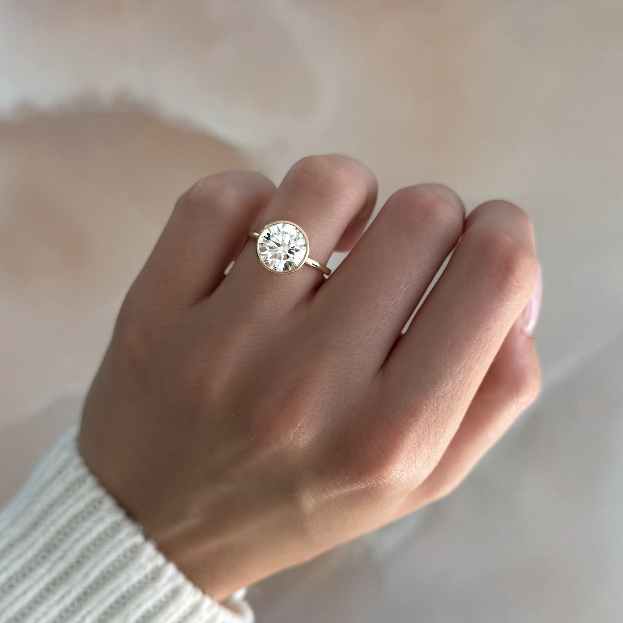 Penumbra Bezel Set Engagement Ring With Round Cut
