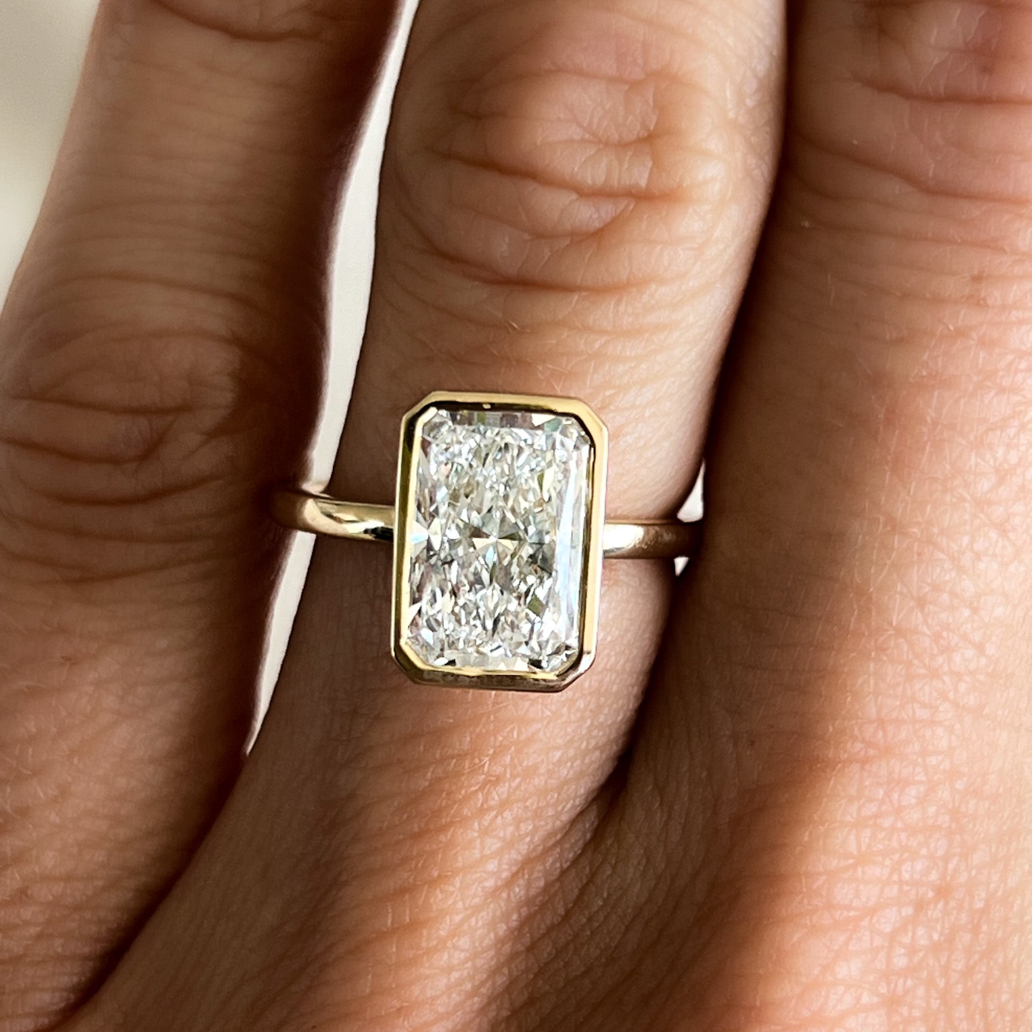 Penumbra Bezel Set Engagement Ring With Elongated Radiant Cut