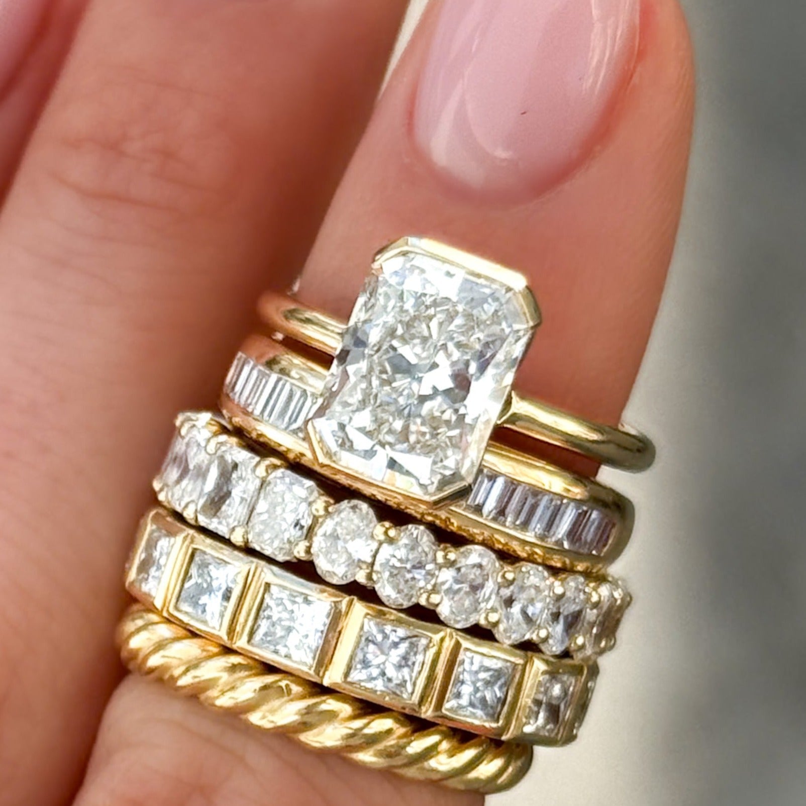 North South Half Bezel Solitaire Engagement Ring With Elongated Radiant Cut Diamond