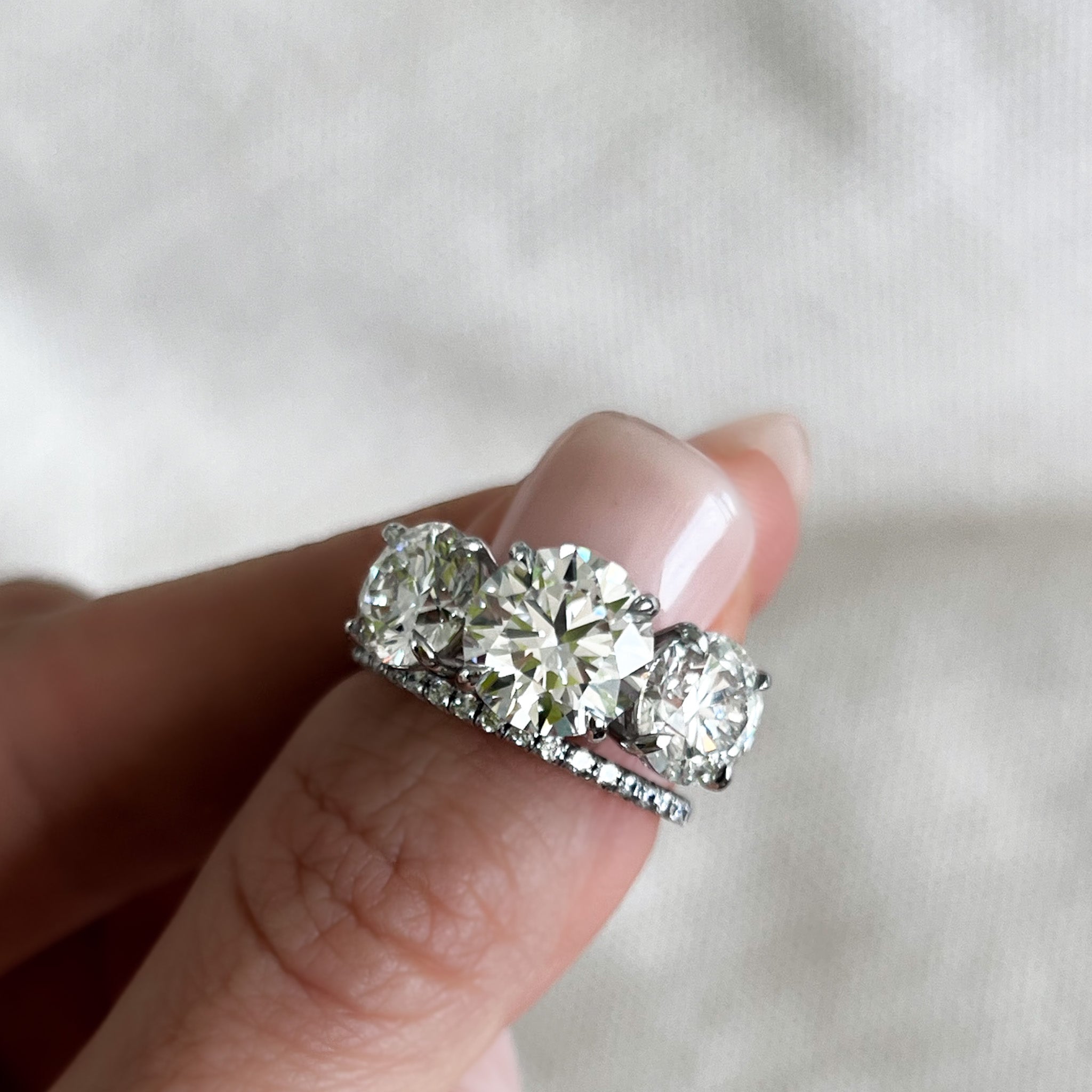 Triad Engagement Ring With Round Cut Diamonds