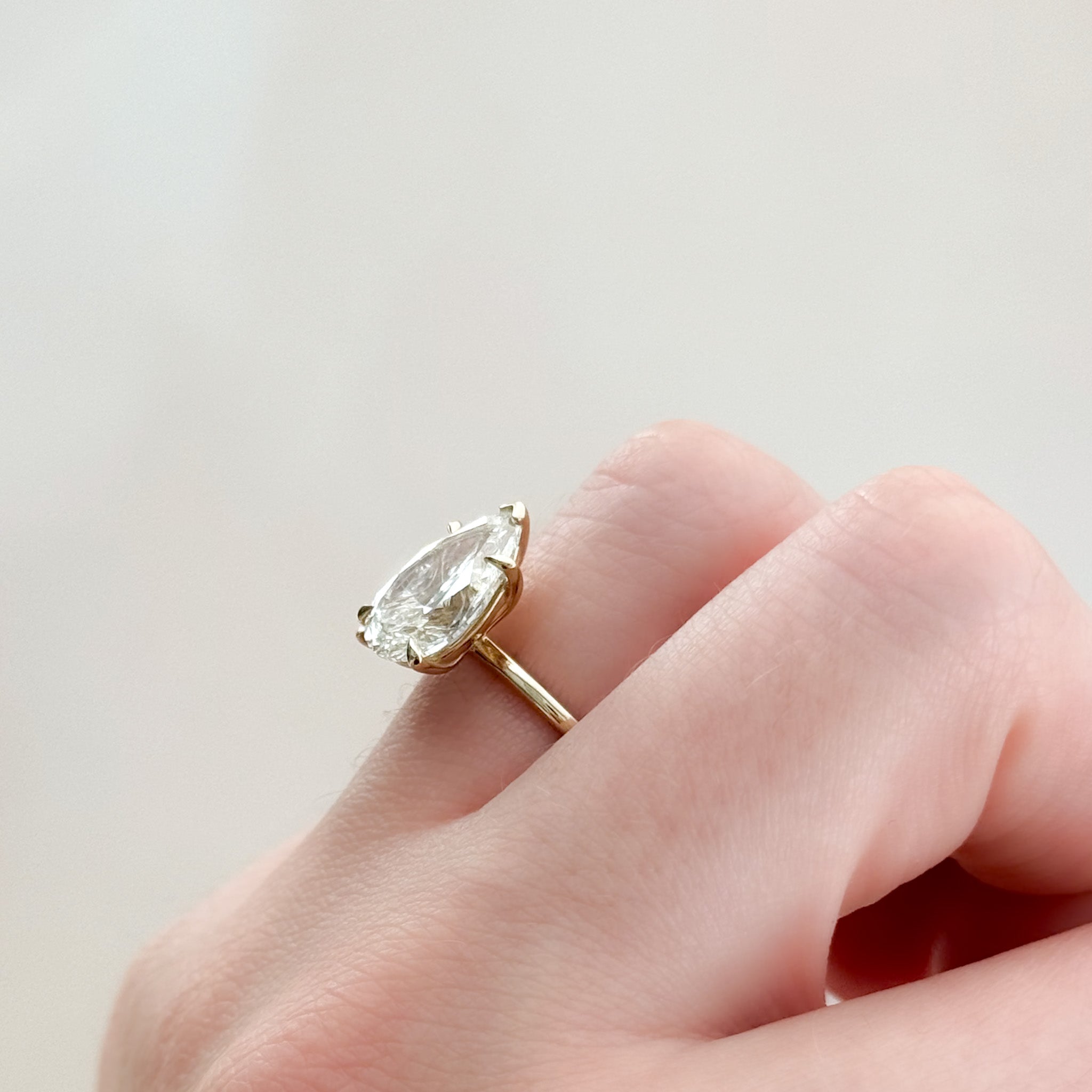 Lotus Engagement Ring With Pear Cut Diamond