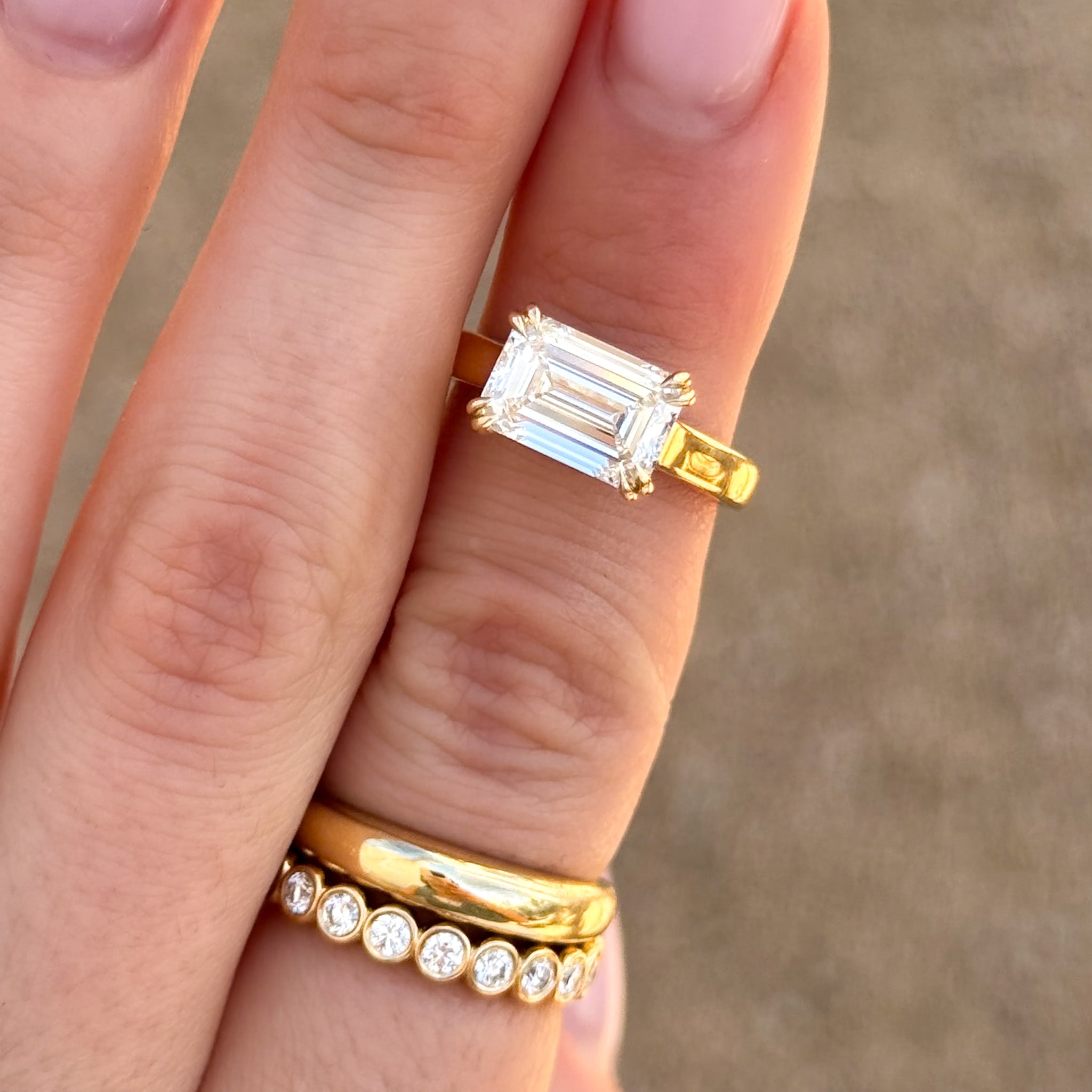 Signature Cathedral Solitaire Engagement Ring With Emerald Cut Diamond (East West)