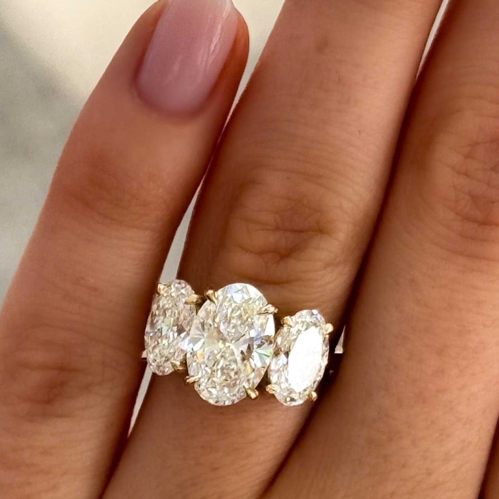 Triad Engagement Ring With Oval Cut Diamonds