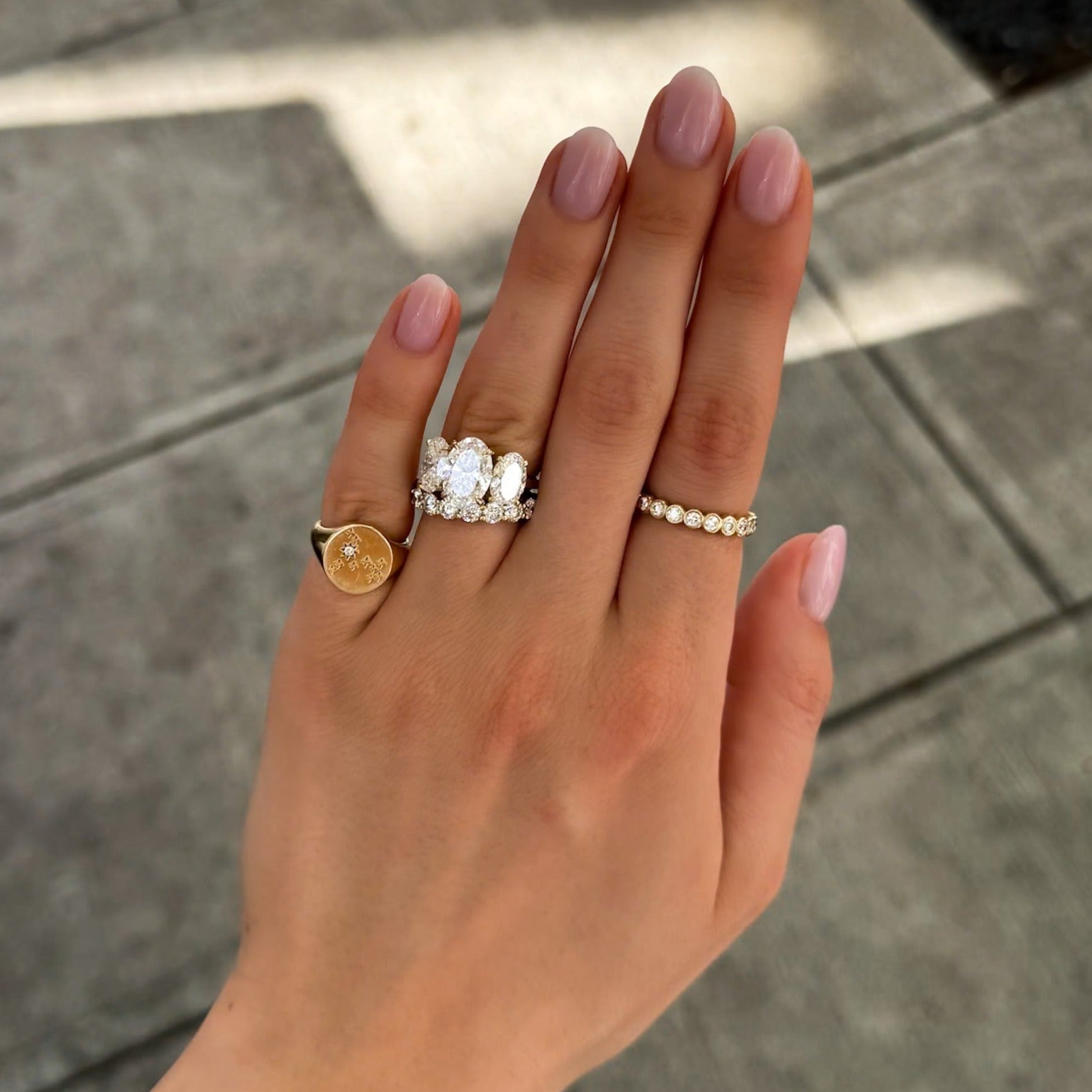 Triad Engagement Ring With Oval Cut Diamonds
