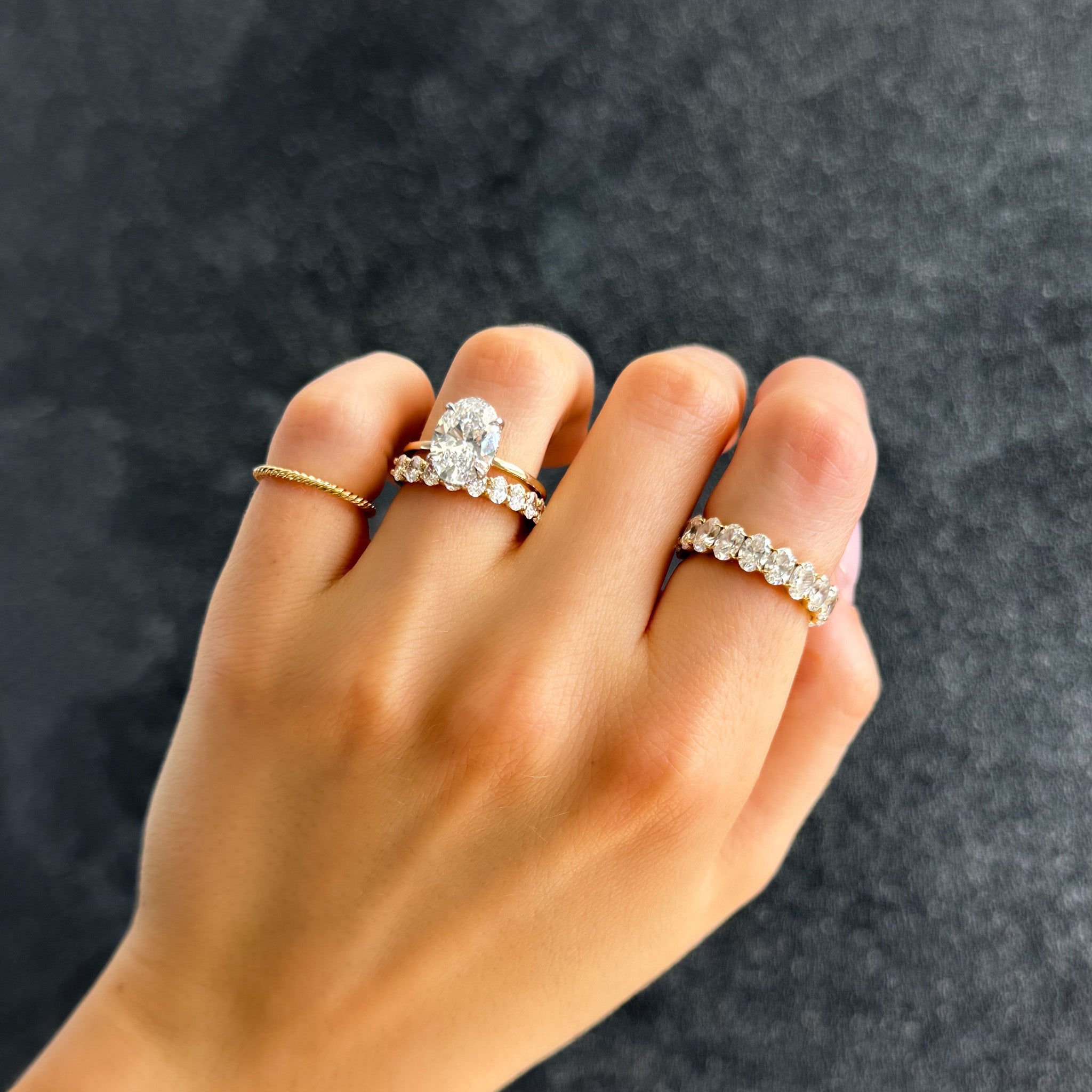 Thin + Simple Solitaire Engagement Ring With Oval Cut Diamond