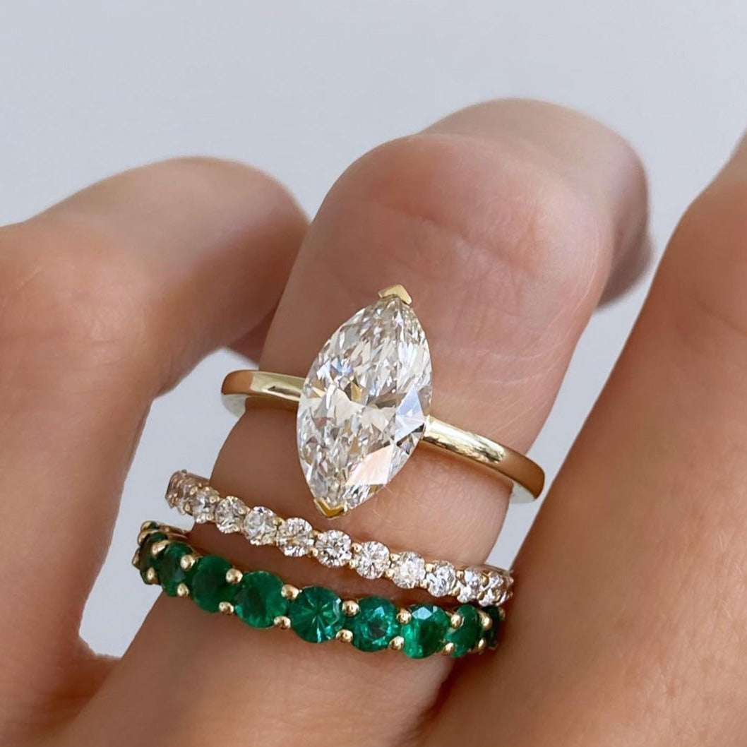 North South Half Bezel Solitaire Engagement Ring With Marquise Cut Diamond
