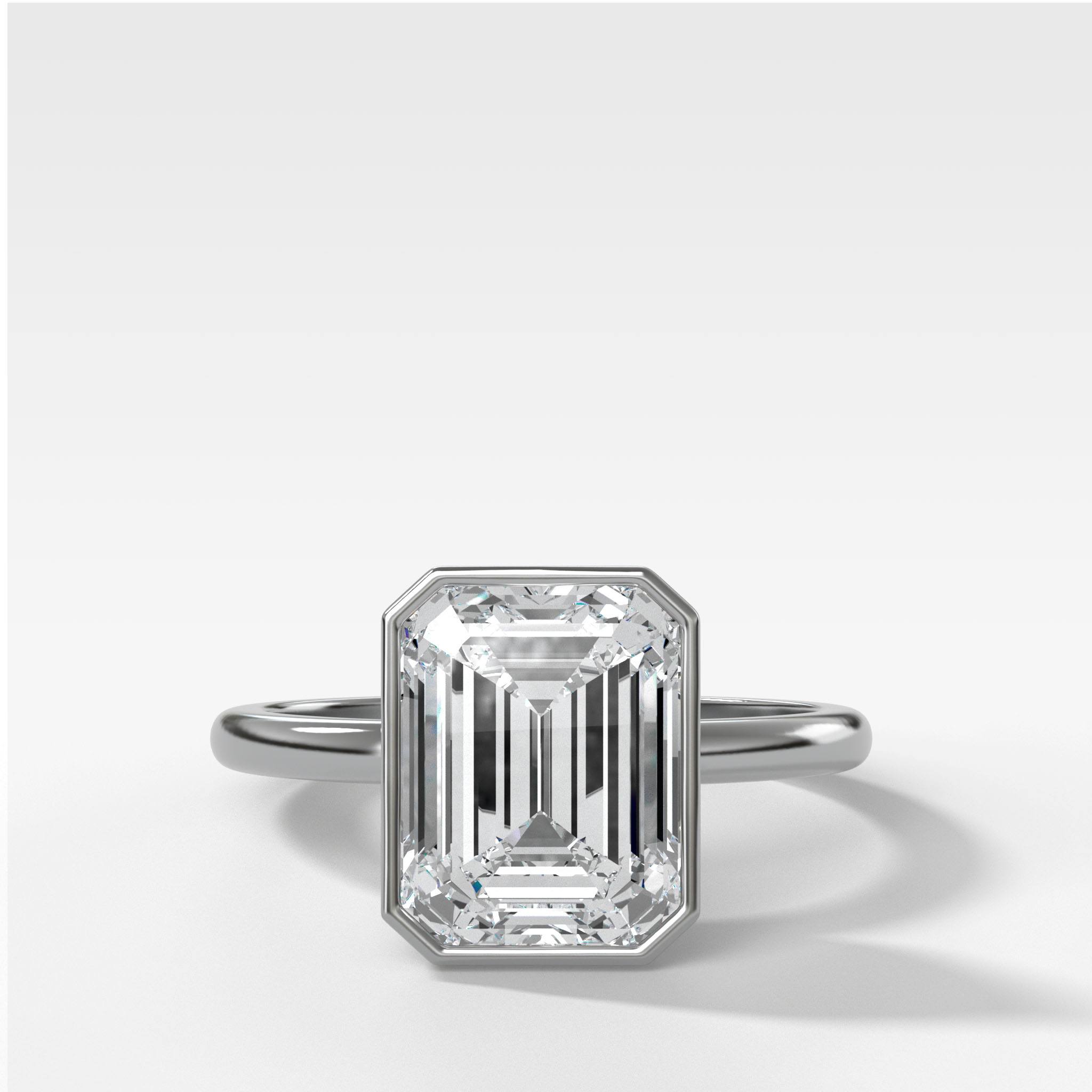 Penumbra Bezel Set Engagement Ring With Emerald Cut