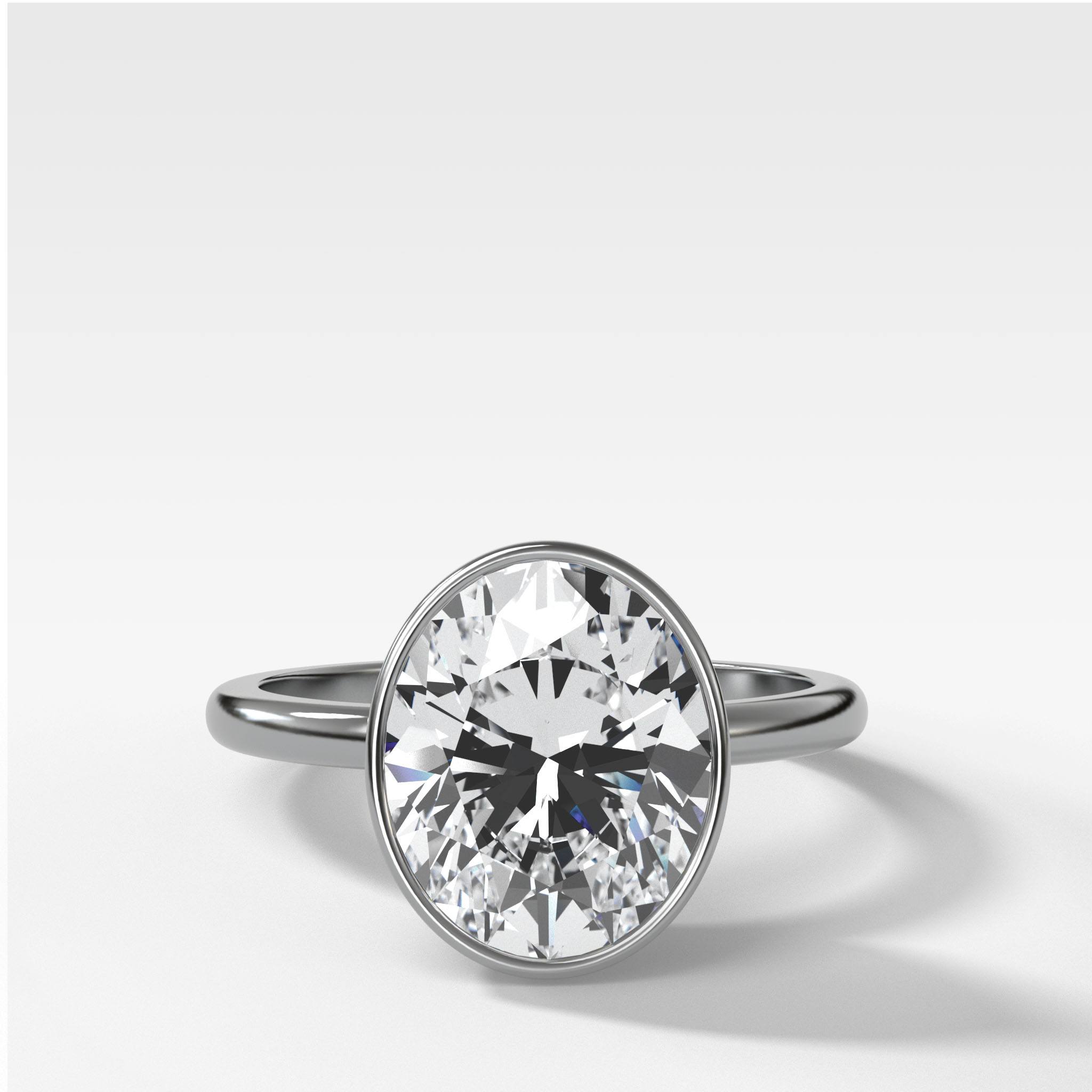 Penumbra Bezel Set Engagement Ring With Oval Cut