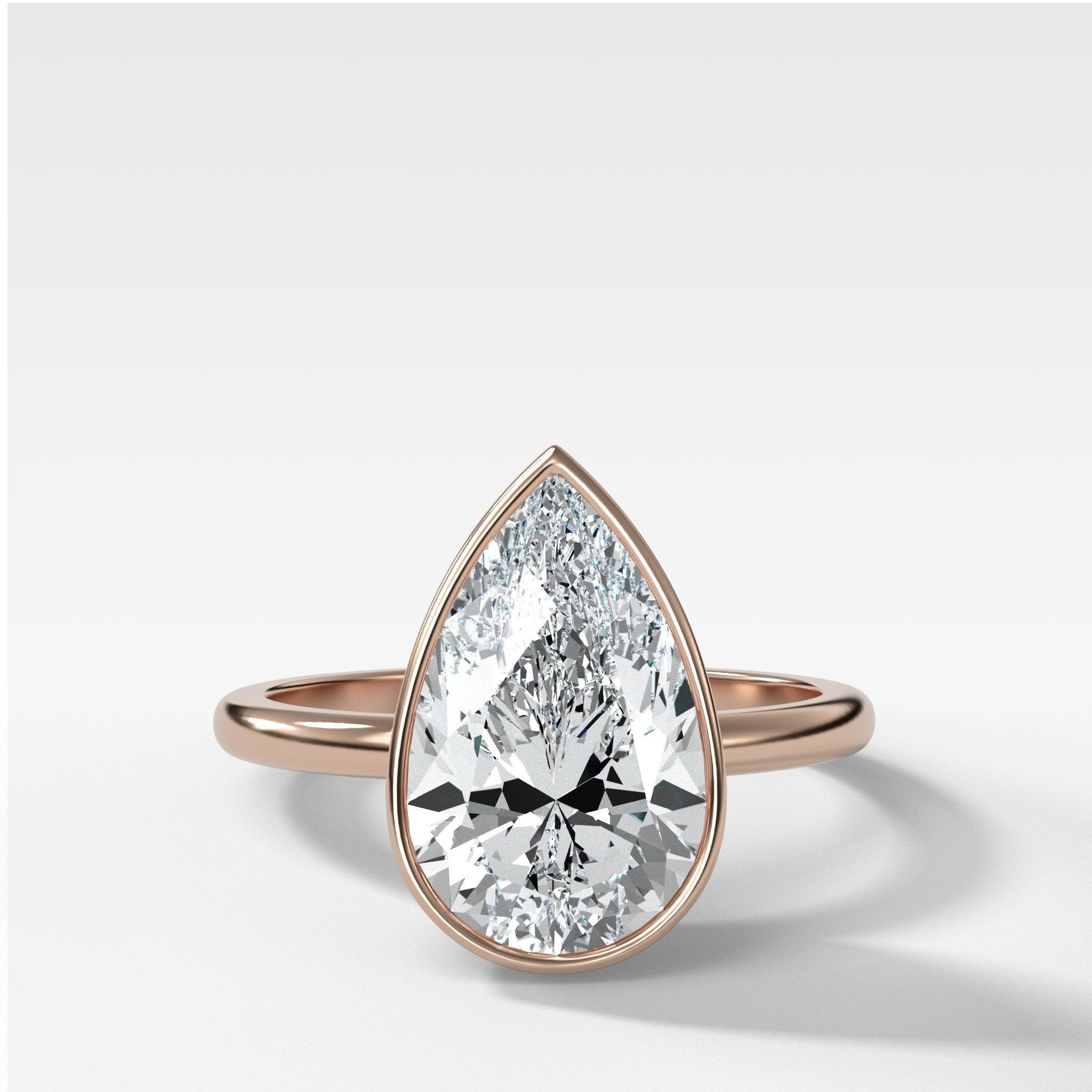 Penumbra Bezel Set Engagement Ring With Pear Cut