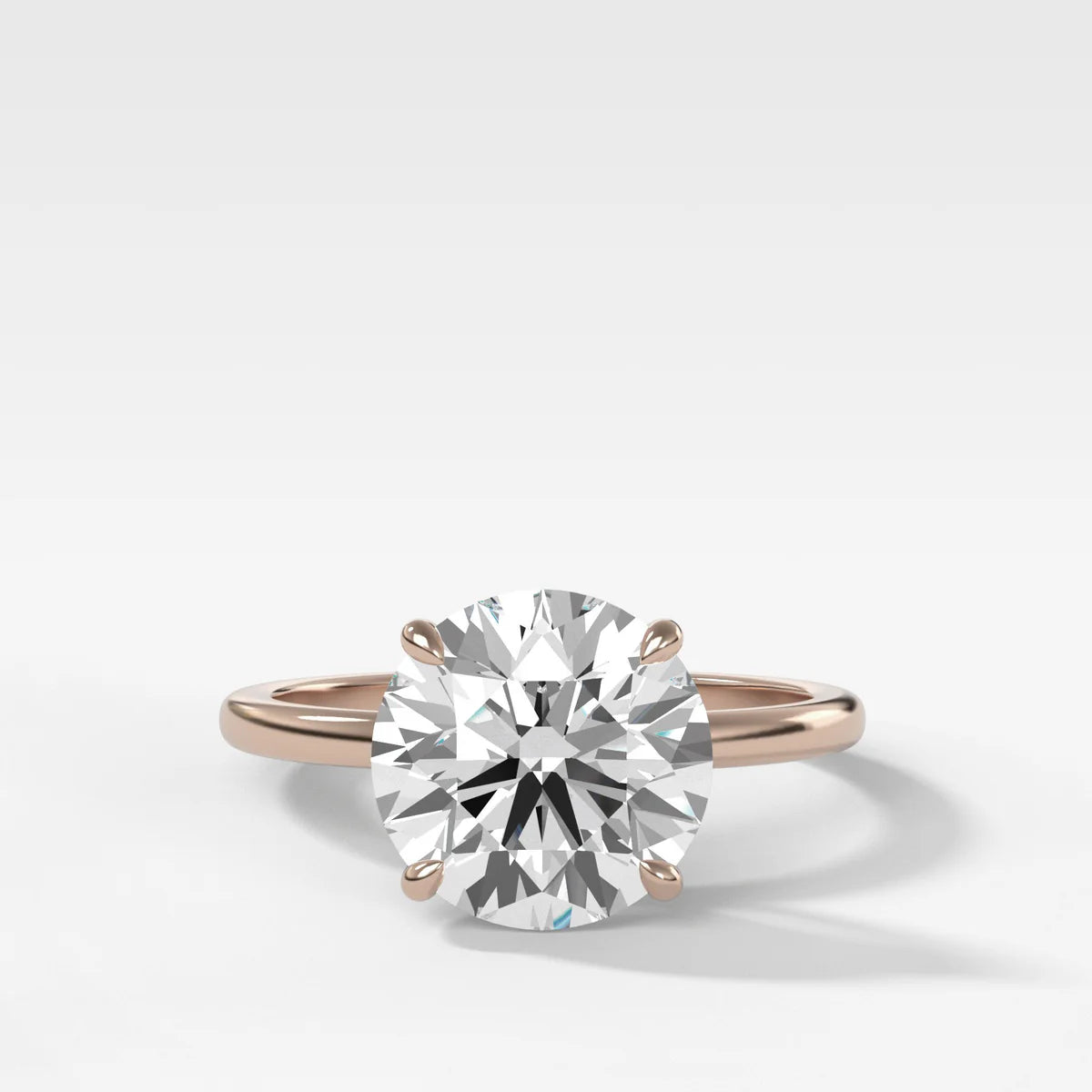 Crescent Solitaire Engagement Ring With Round Cut Diamond