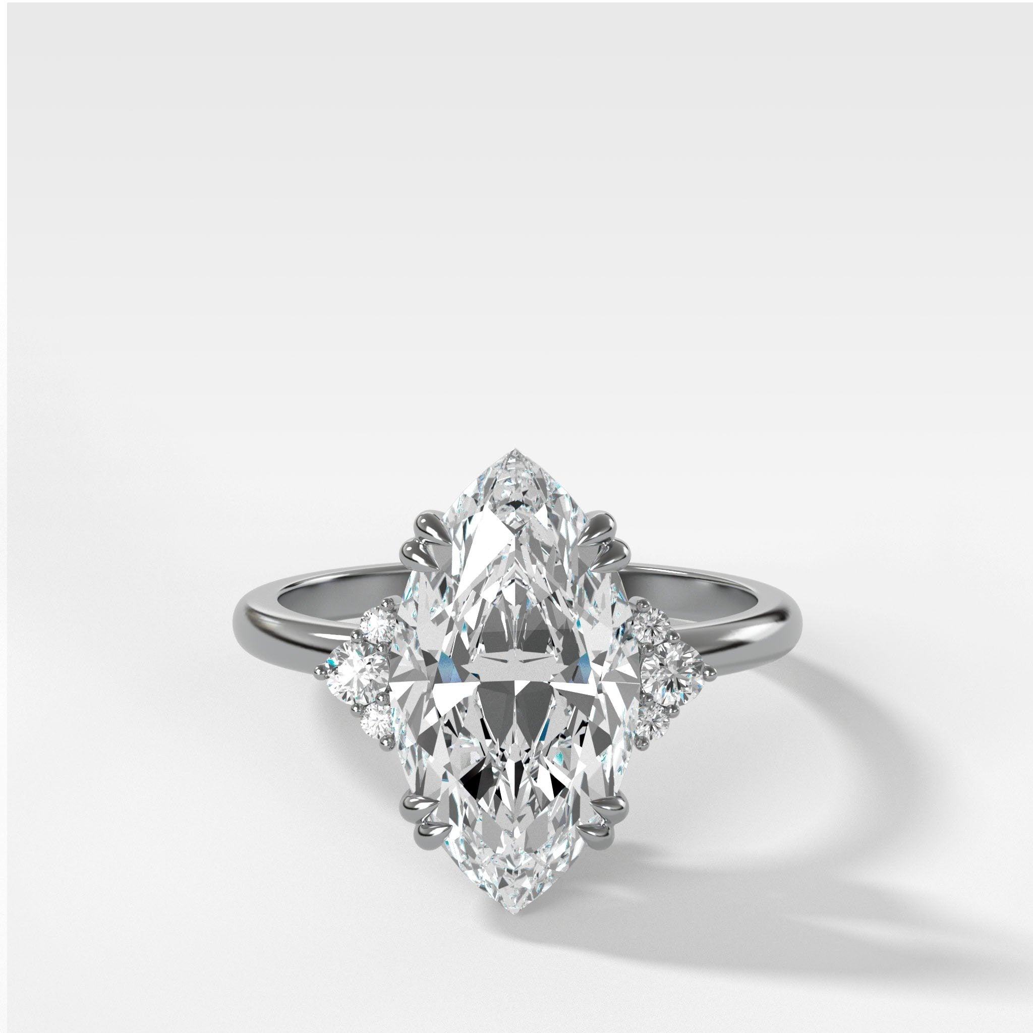 Signature Cluster Engagement Ring With Marquise Cut Diamond