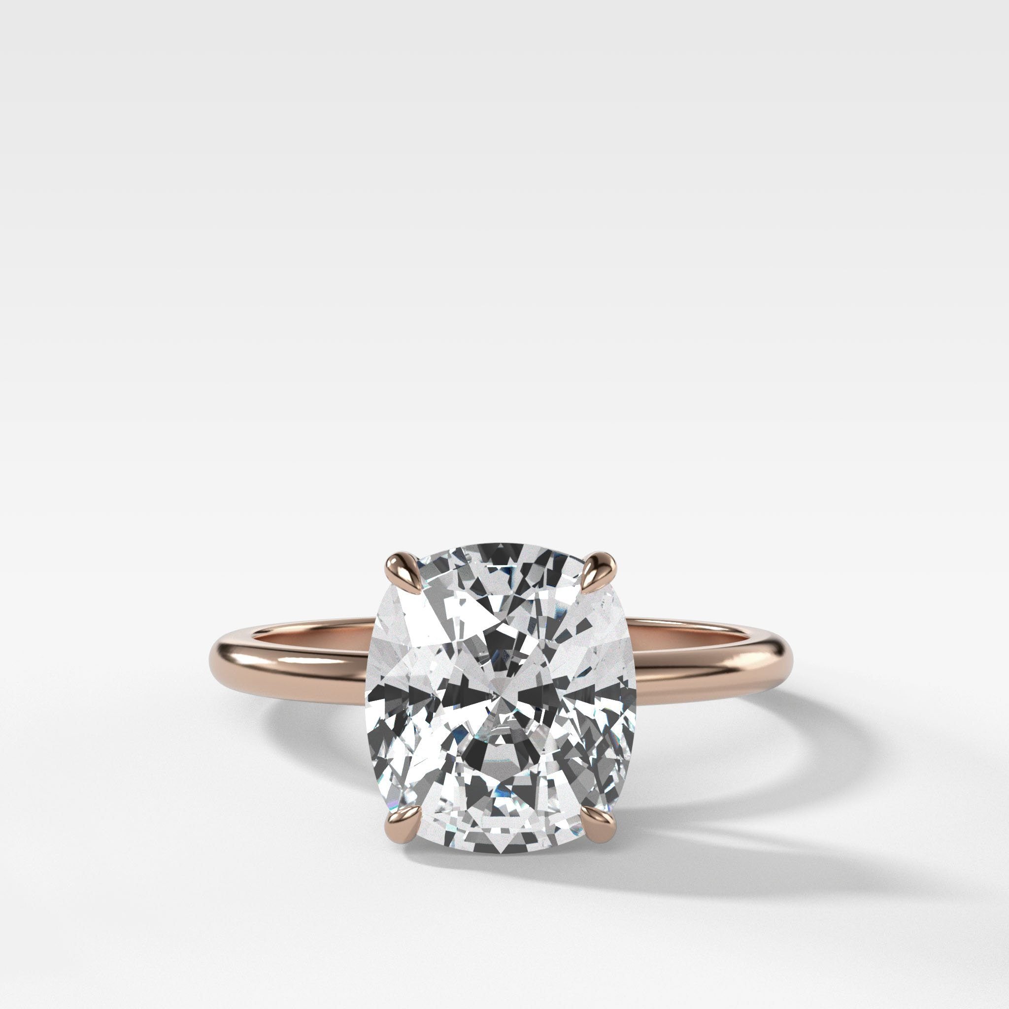Thin + Simple Solitaire Engagement Ring With Elongated Cushion Cut Diamond