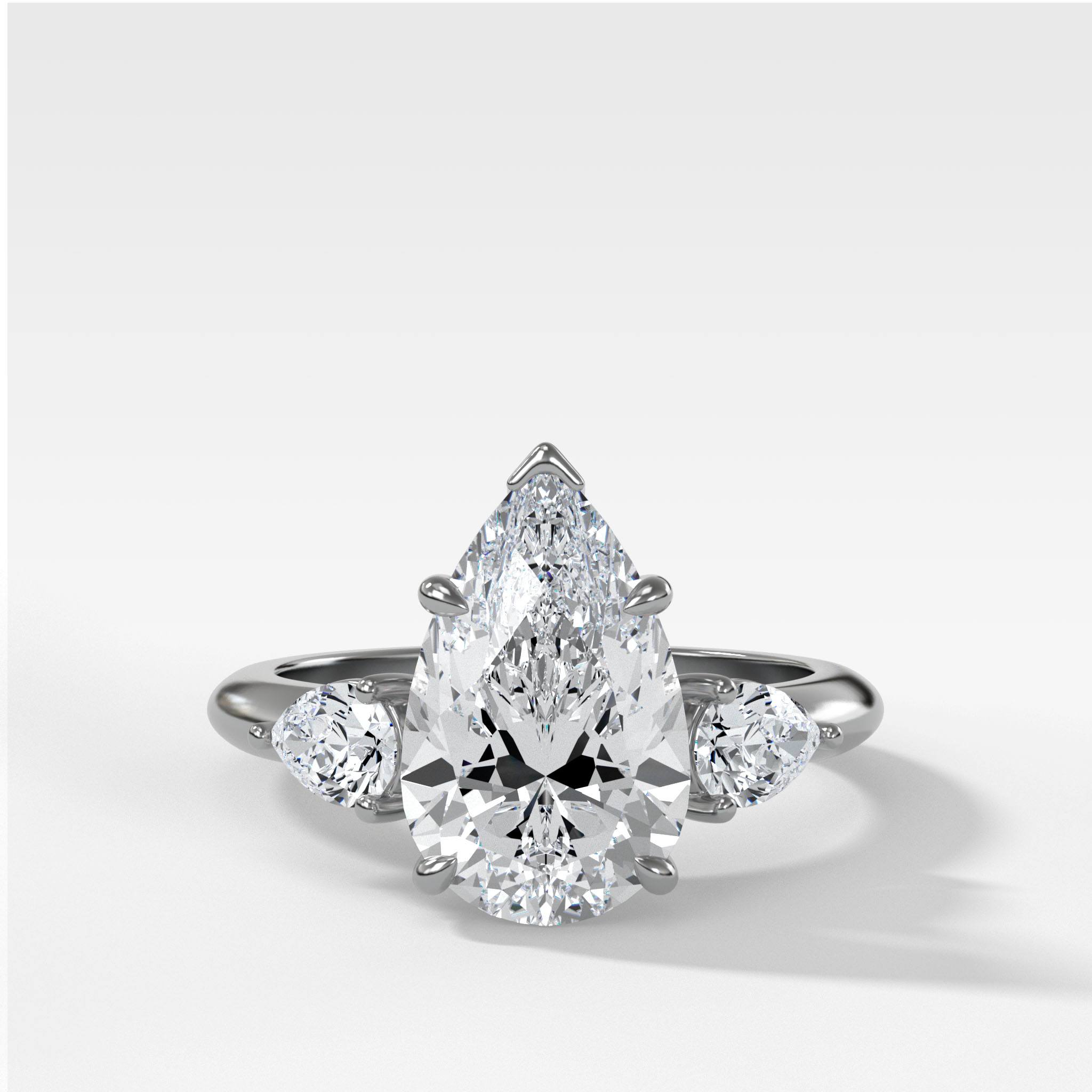 Three Stone Engagement Ring With Pear Side Stones and Pear Cut Diamond