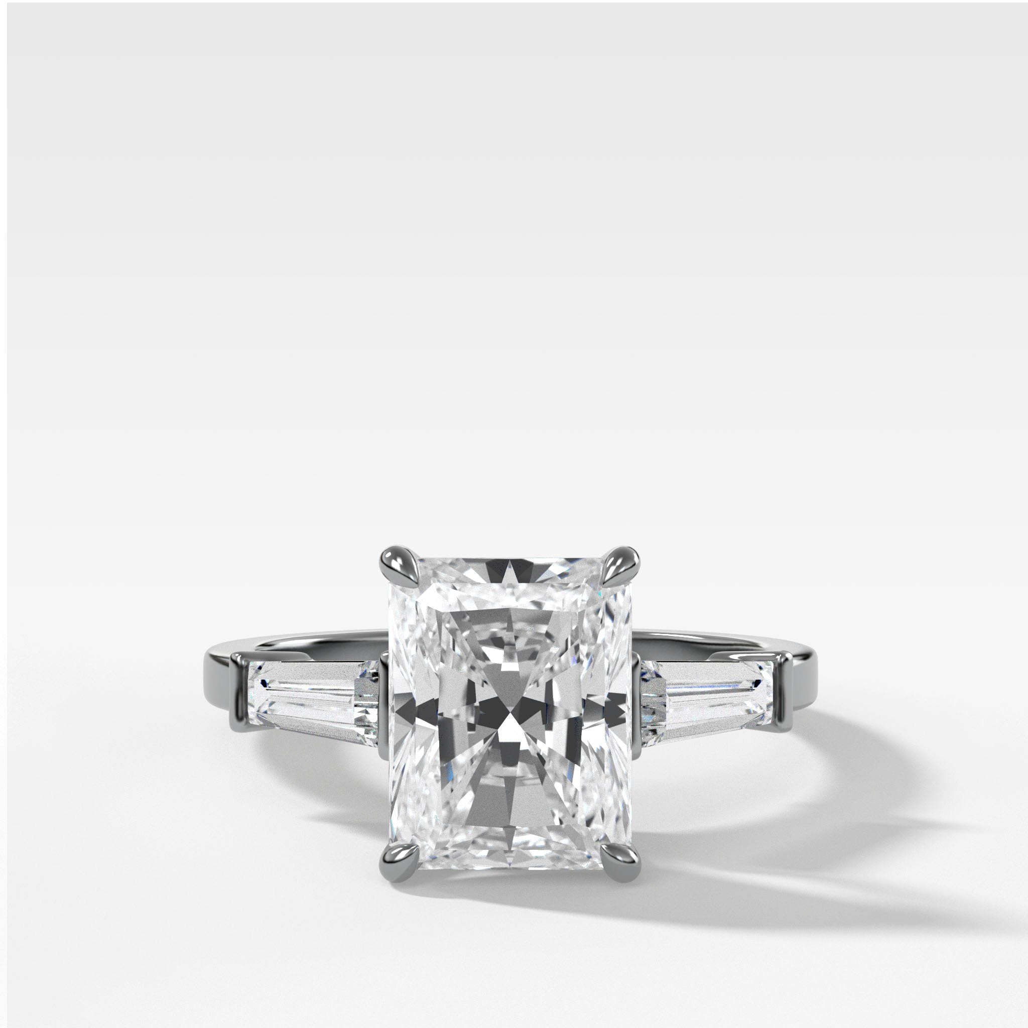 Translunar Tapered Baguette Engagement Ring With Elongated Radiant Cut Diamond
