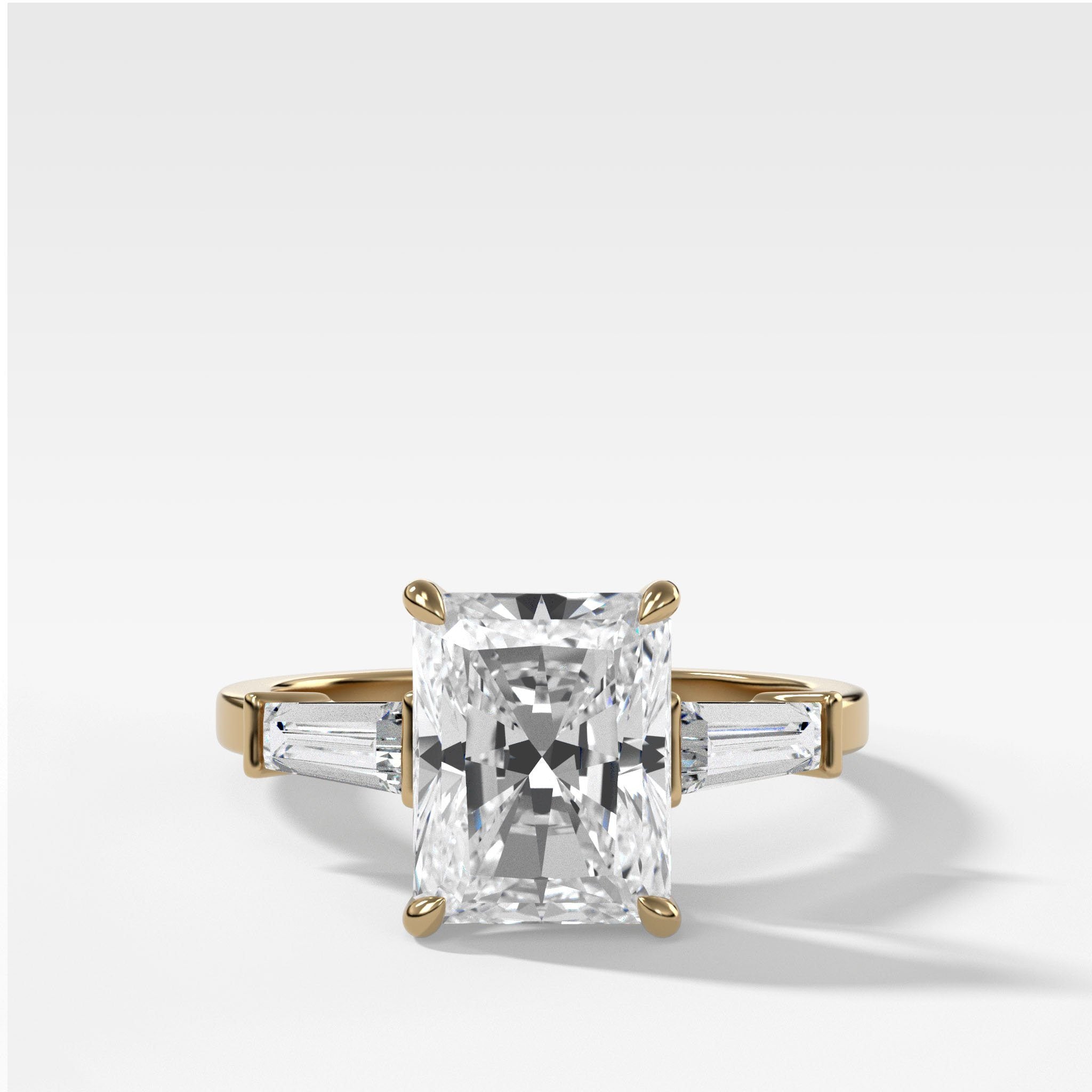 Translunar Tapered Baguette Engagement Ring With Elongated Radiant Cut Diamond