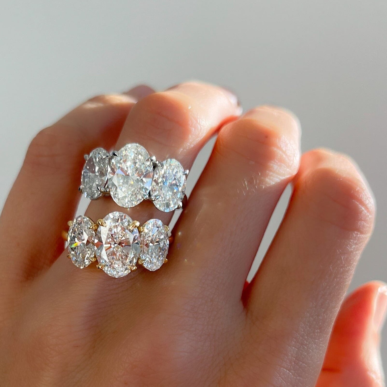 Triad Engagement Ring With Oval Cut Diamonds