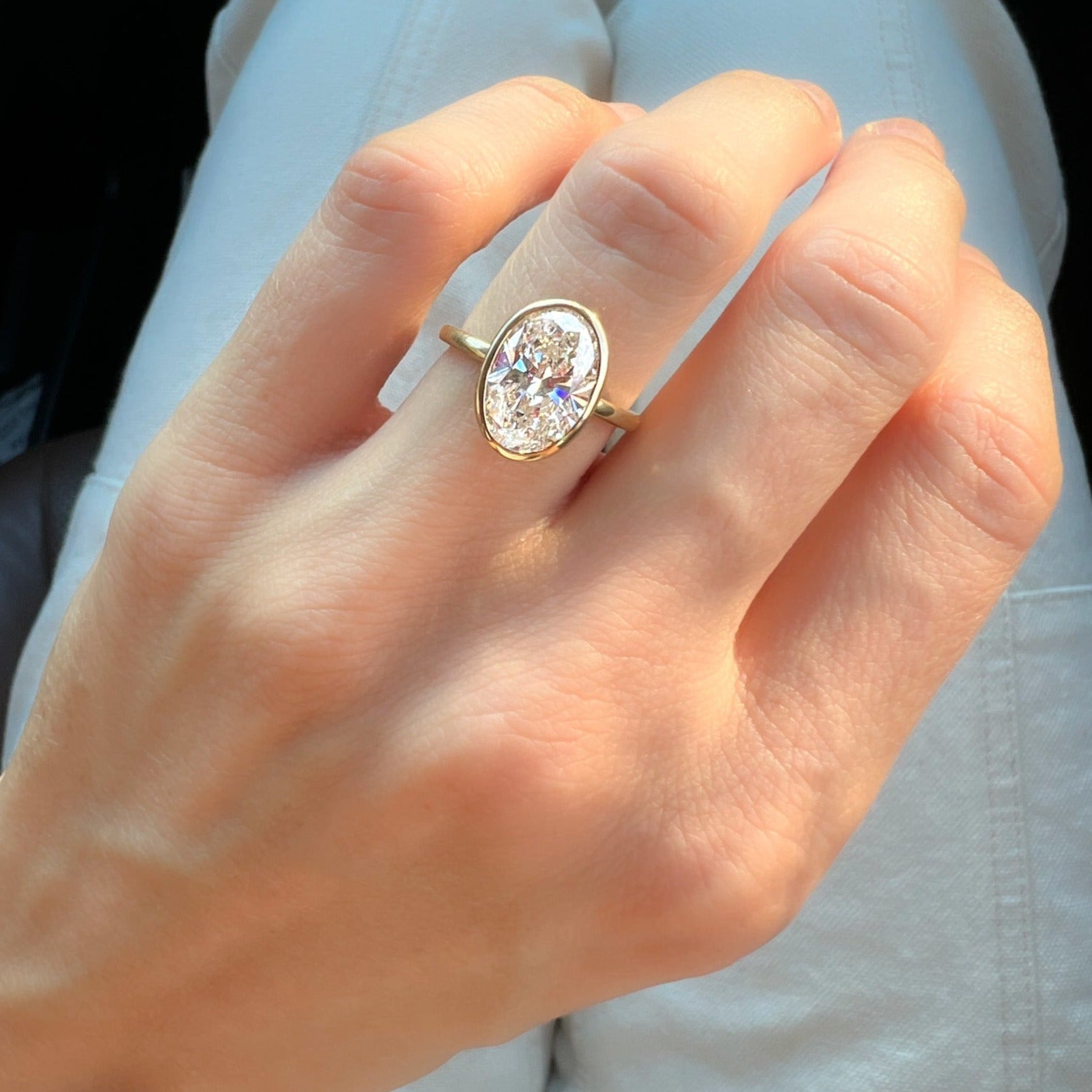 Penumbra Bezel Set Engagement Ring With Oval Cut