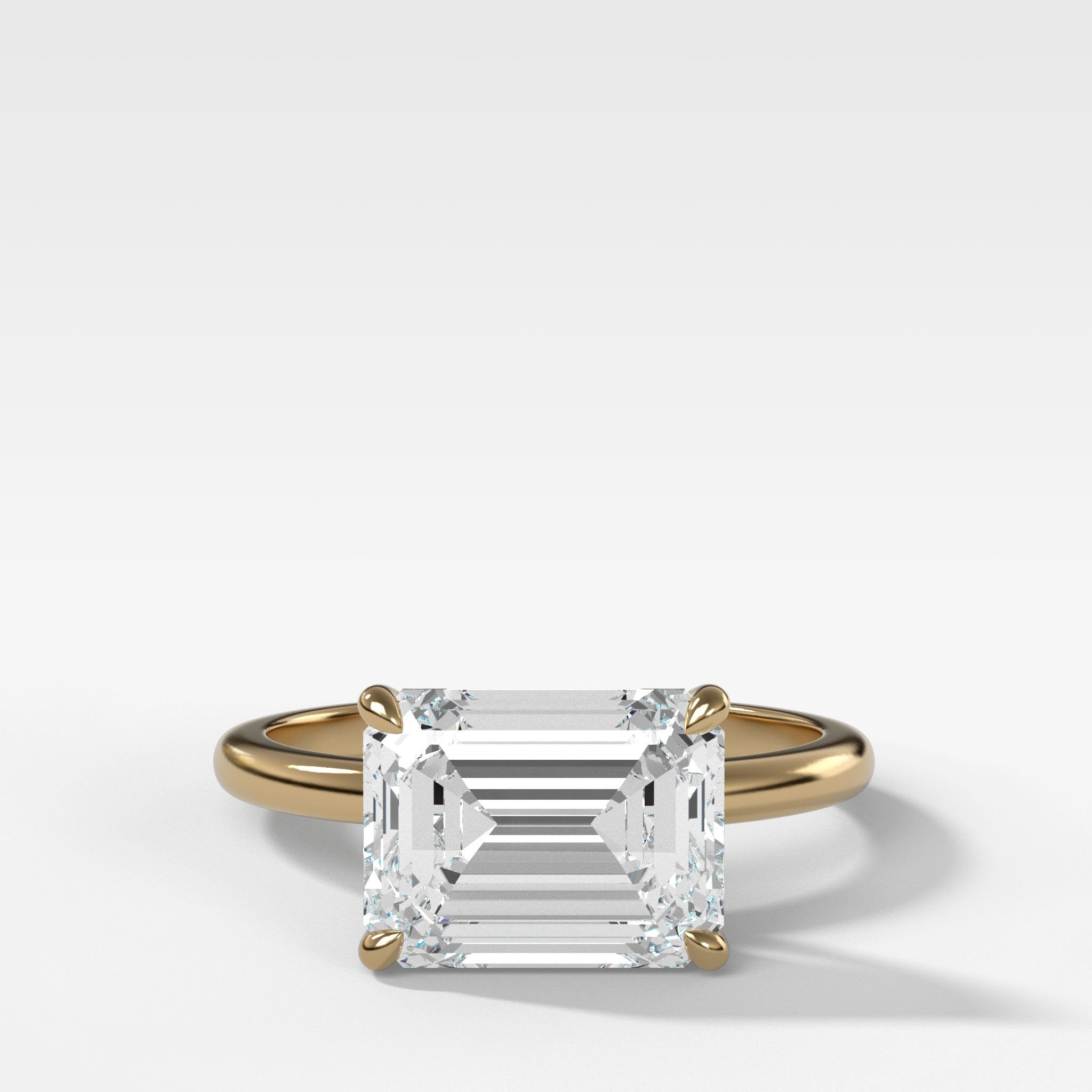 Crescent Solitaire Engagement Ring With Emerald Cut Diamond (East West)