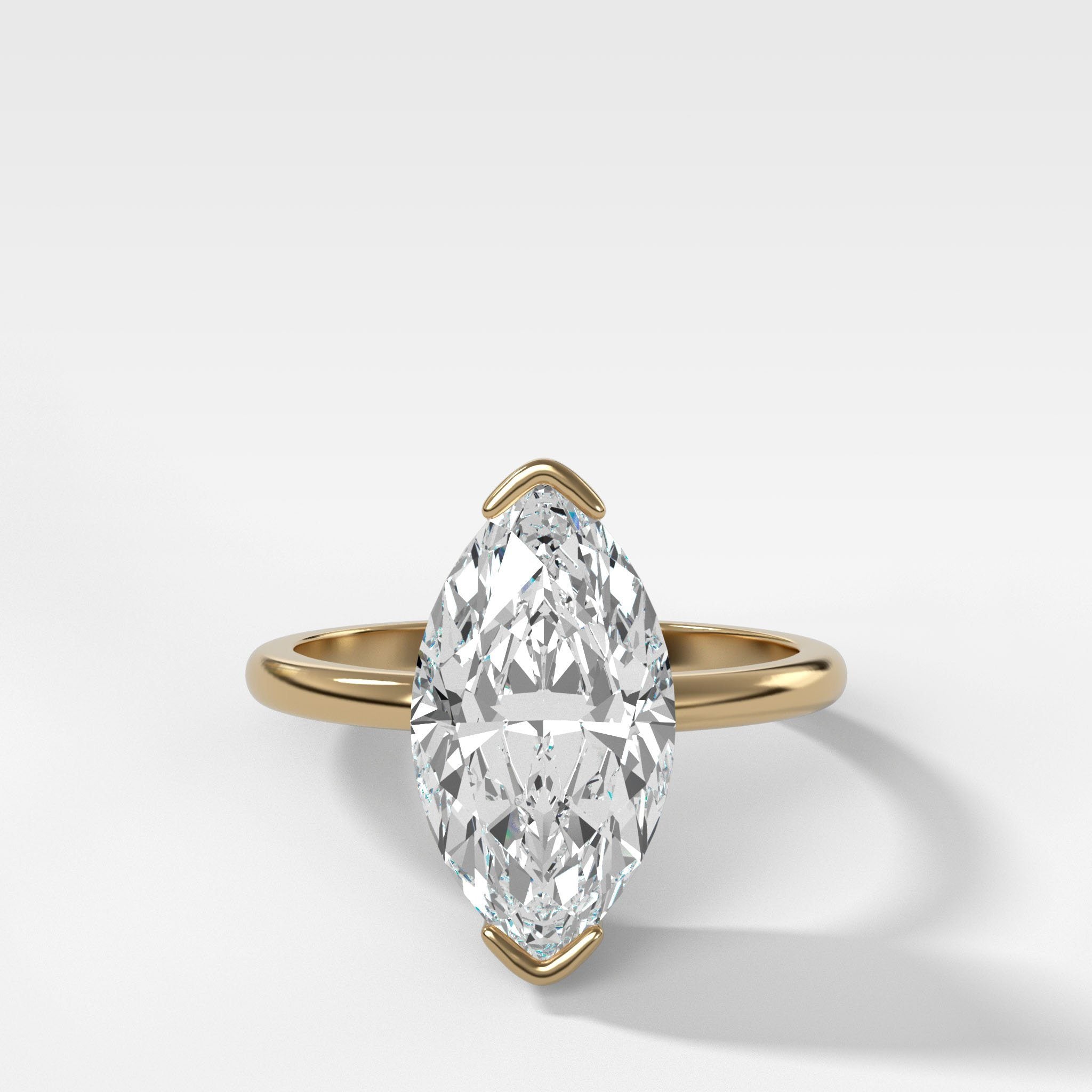 North South Half Bezel Solitaire Engagement Ring With Marquise Cut Diamond