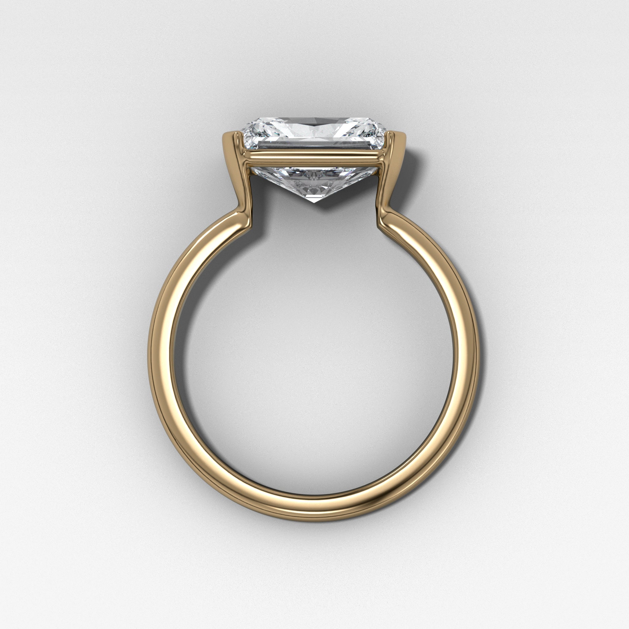 East West Half Bezel Solitaire Engagement Ring With Elongated Radiant Cut Diamond