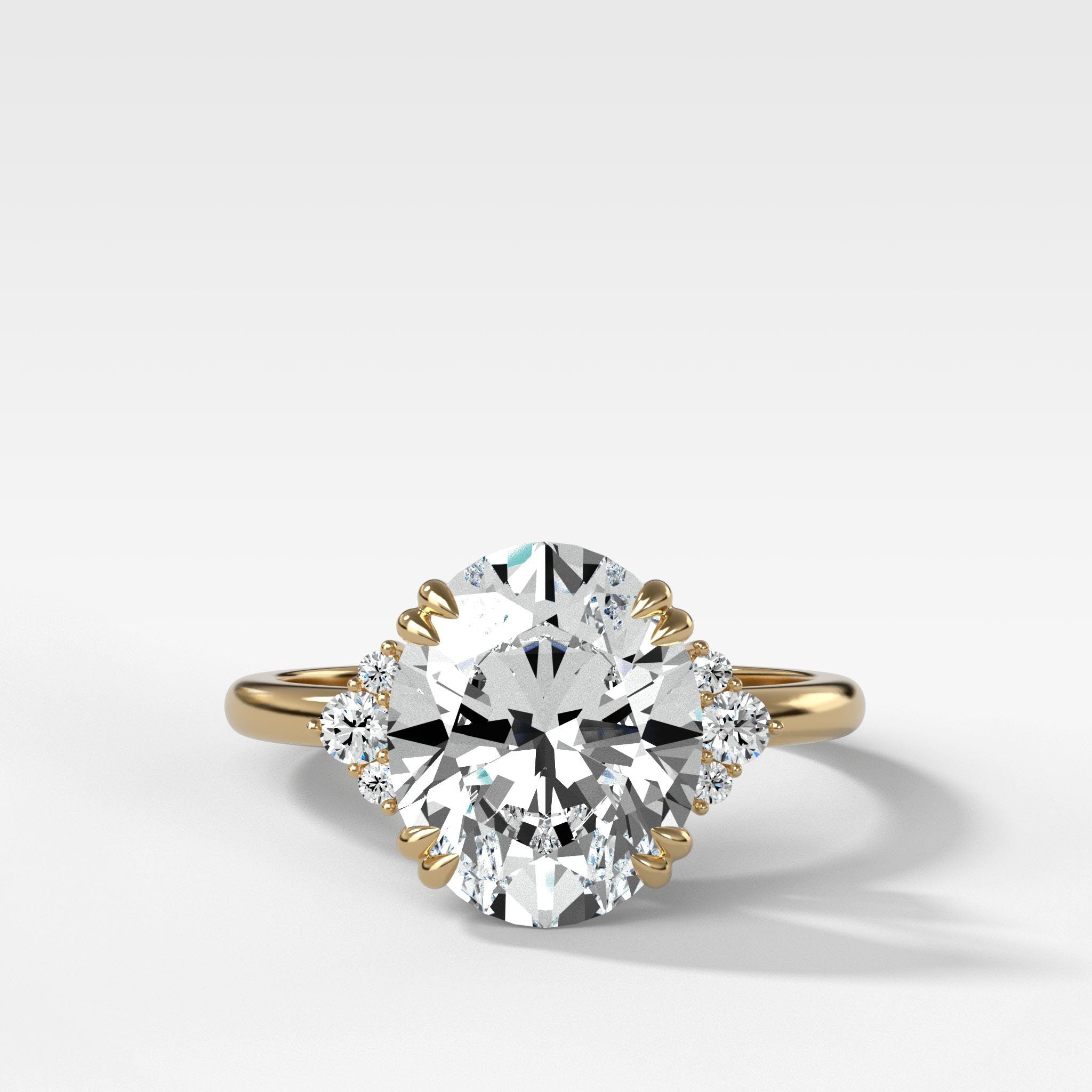 Signature Cluster Engagement Ring With Oval Cut Diamond