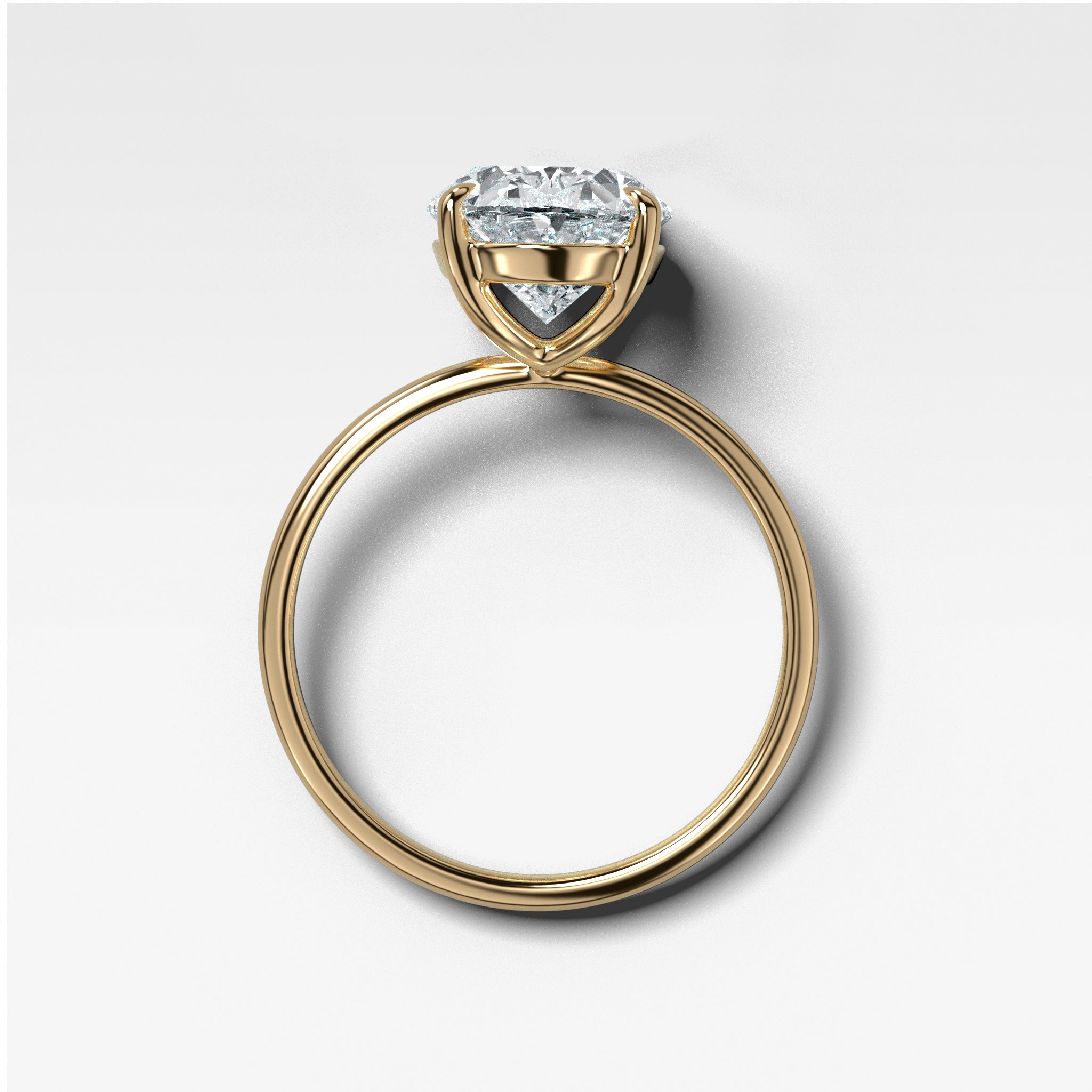 Thin + Simple Solitaire Engagement Ring With Oval Cut Diamond