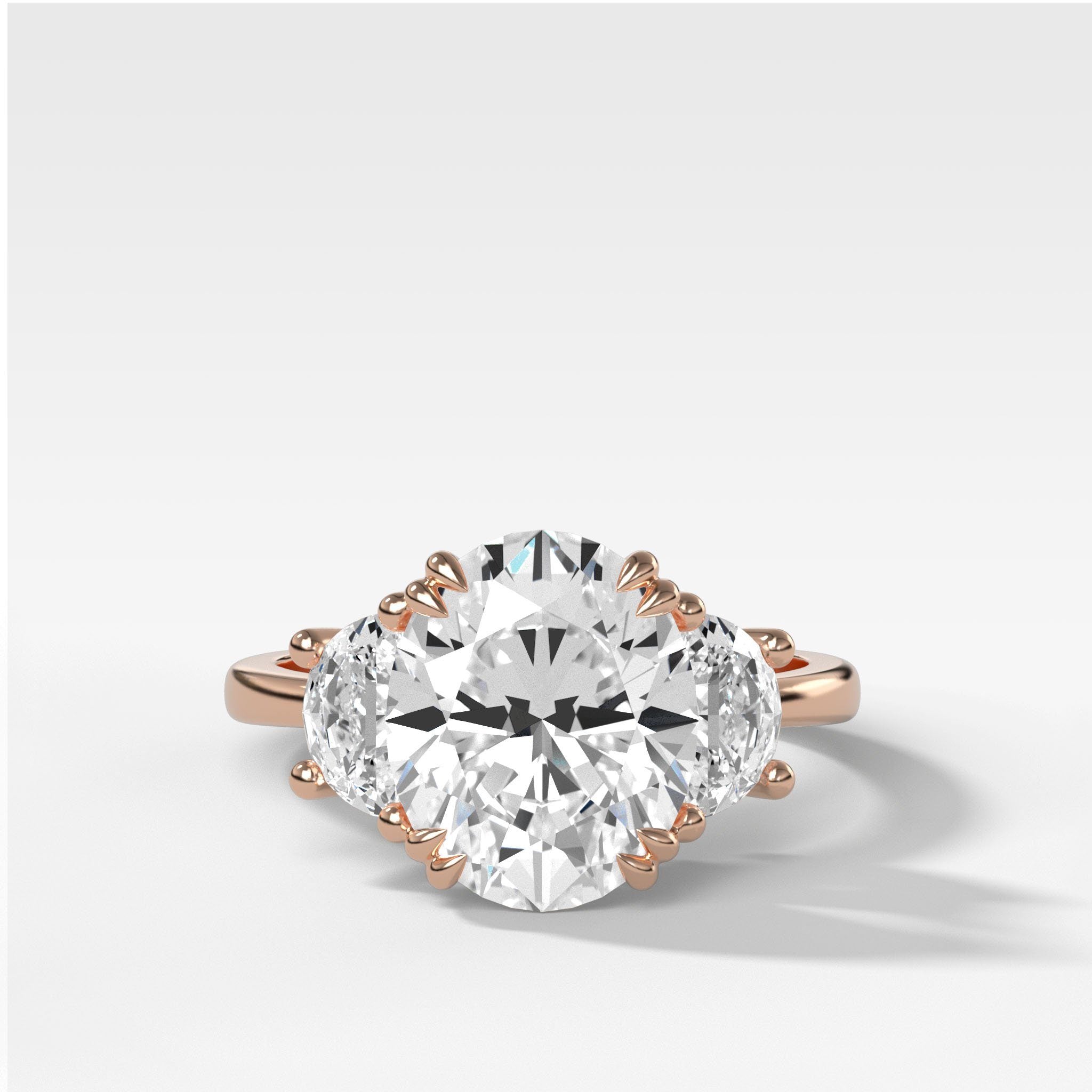 Oval Three Stone Engagement Ring With Half Moon Side Stones