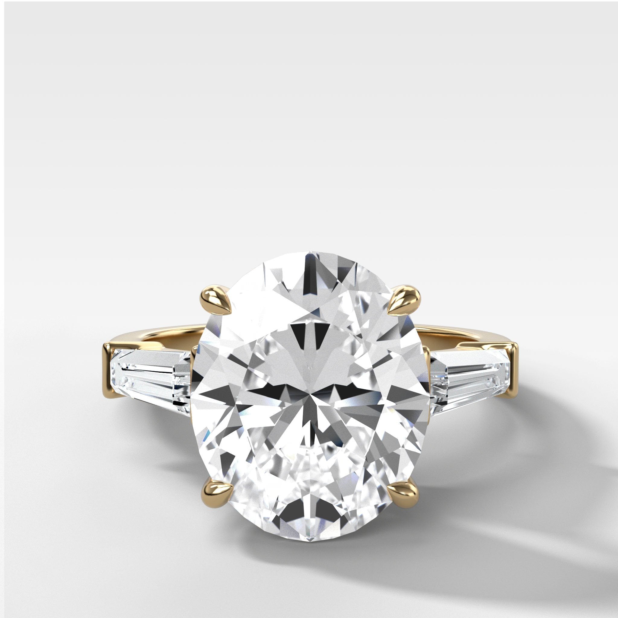 Translunar Tapered Baguette Engagement Ring With Oval Cut Diamond