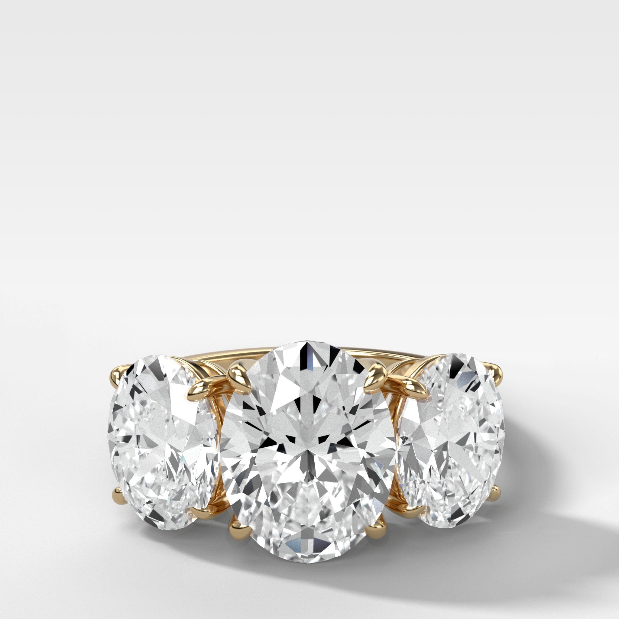 Triad Engagement Ring With Oval Cut Diamonds