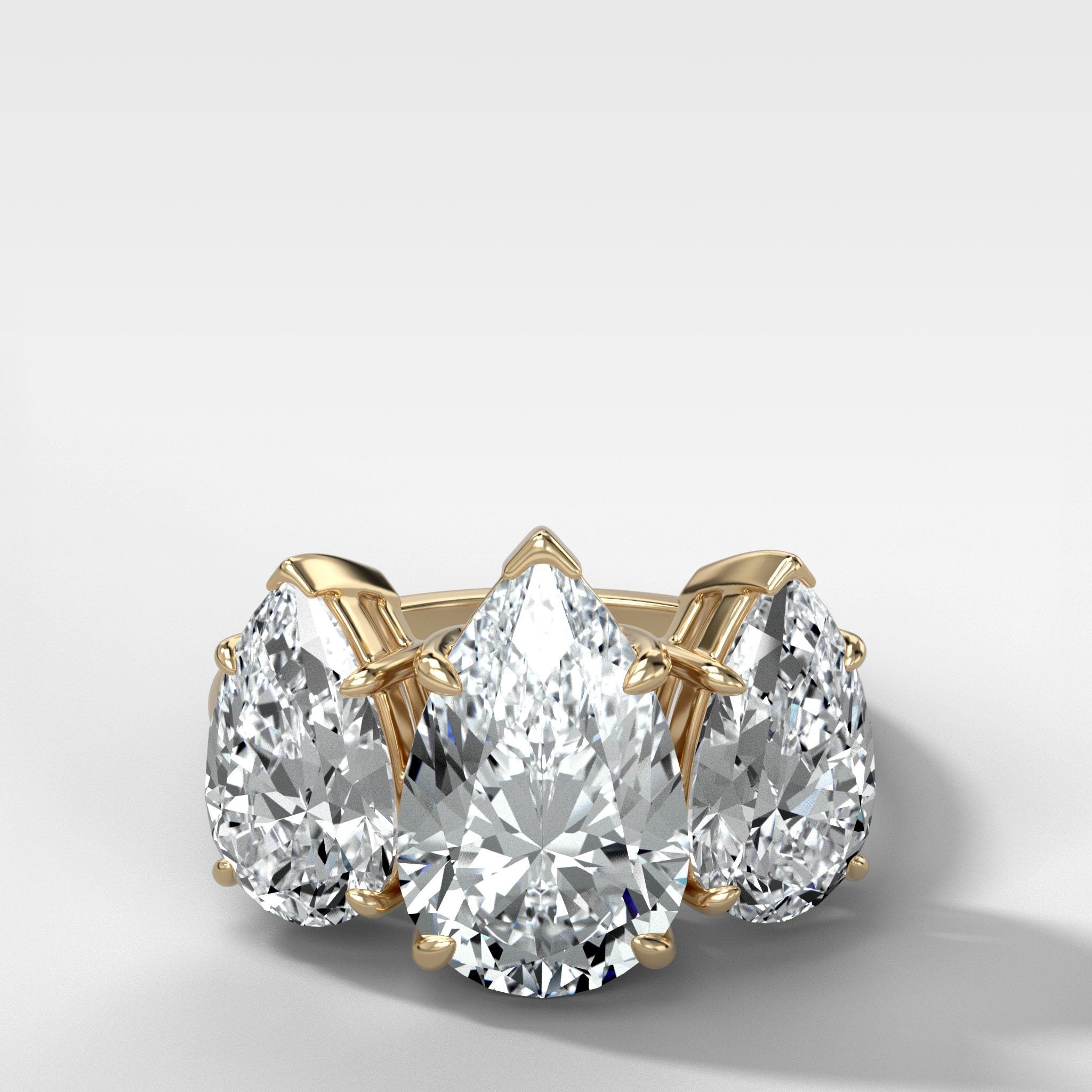 Triad Engagement Ring With Pear Cut Diamonds