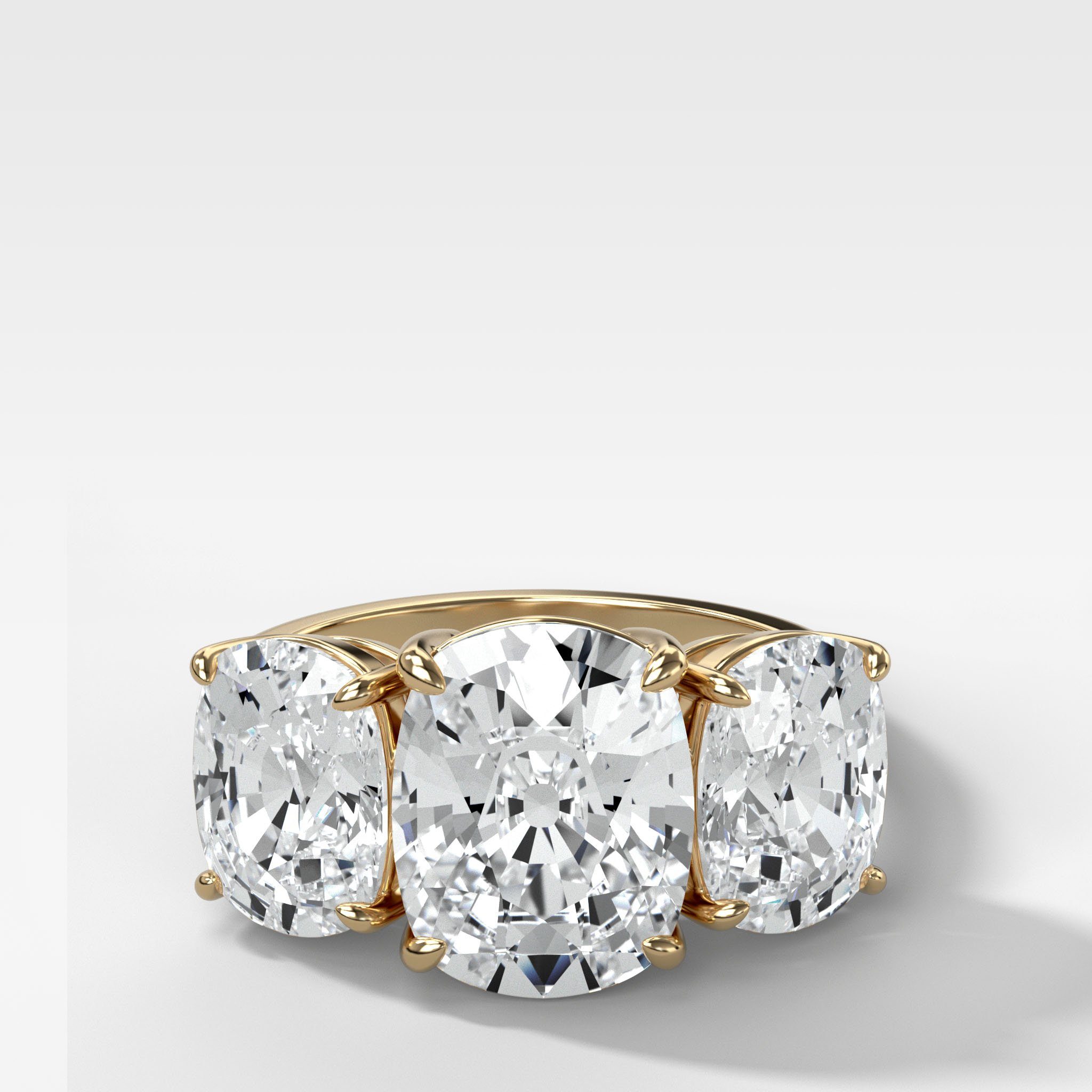 Triad Engagement Ring With Elongated Cushion Cut Diamonds
