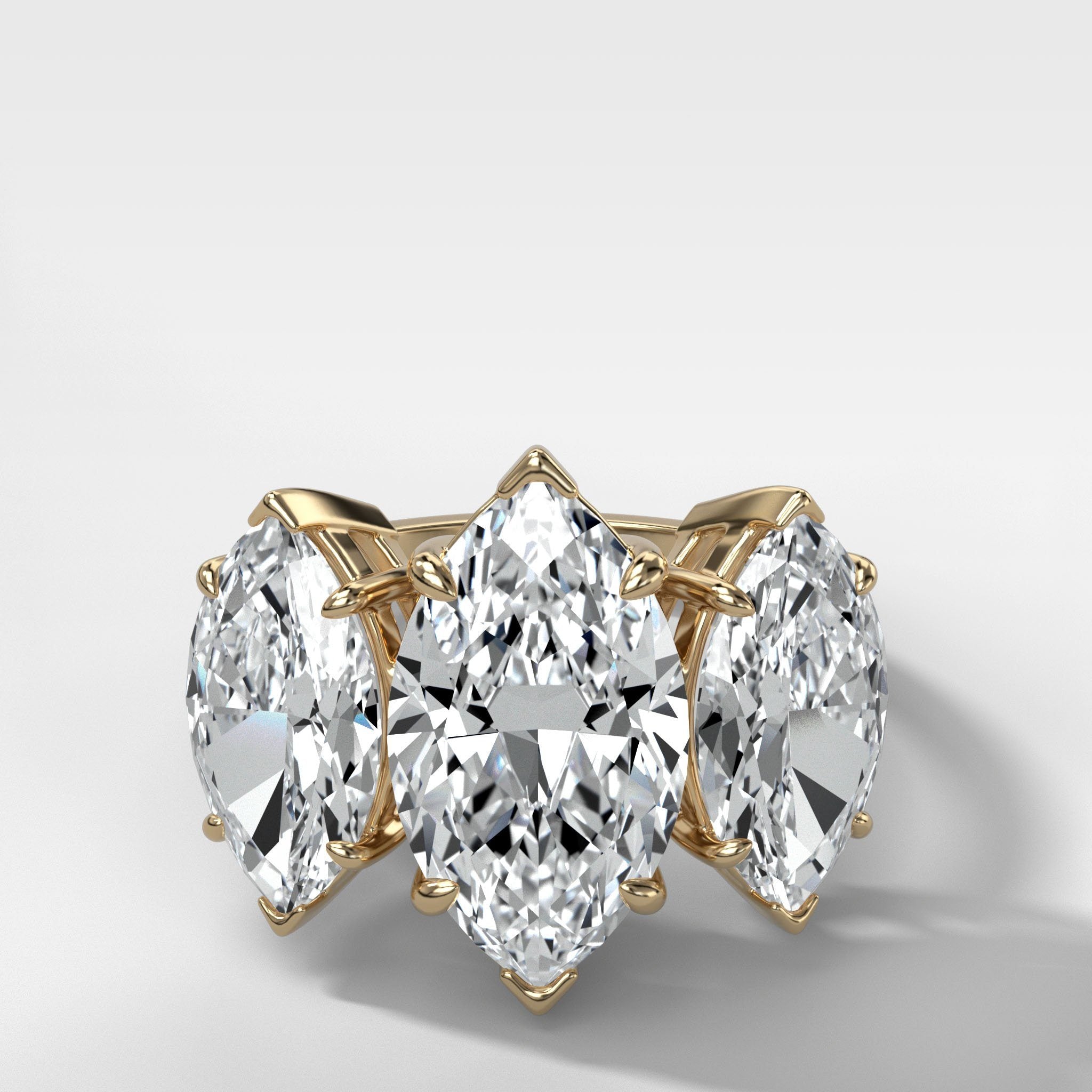 Triad Engagement Ring With Marquise Cut Diamonds