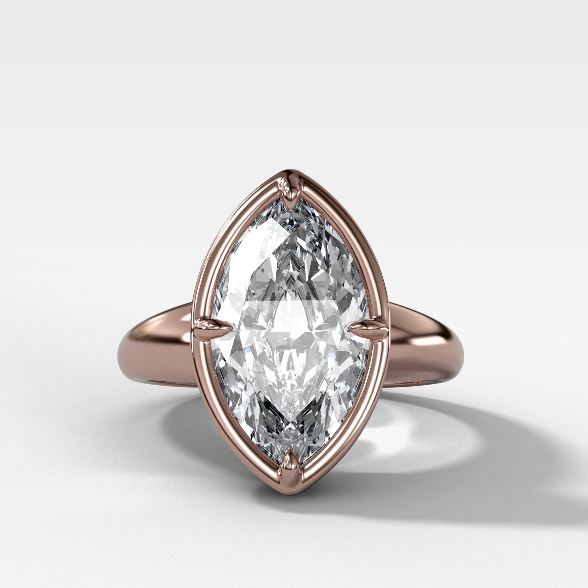 Club Ring Solitaire Engagement Ring With a Marquise Cut Diamond