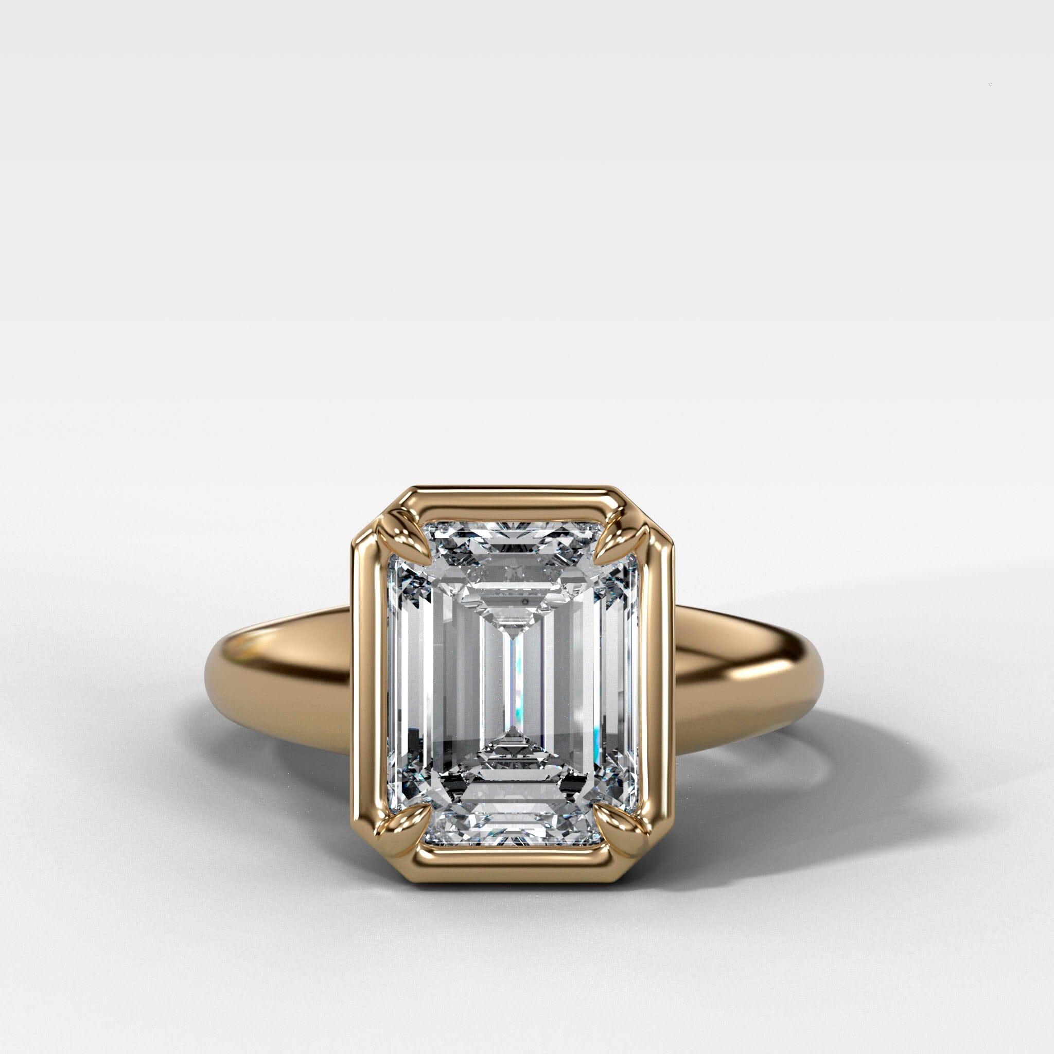 Club Ring Solitaire Engagement Ring With an Emerald Cut Diamond