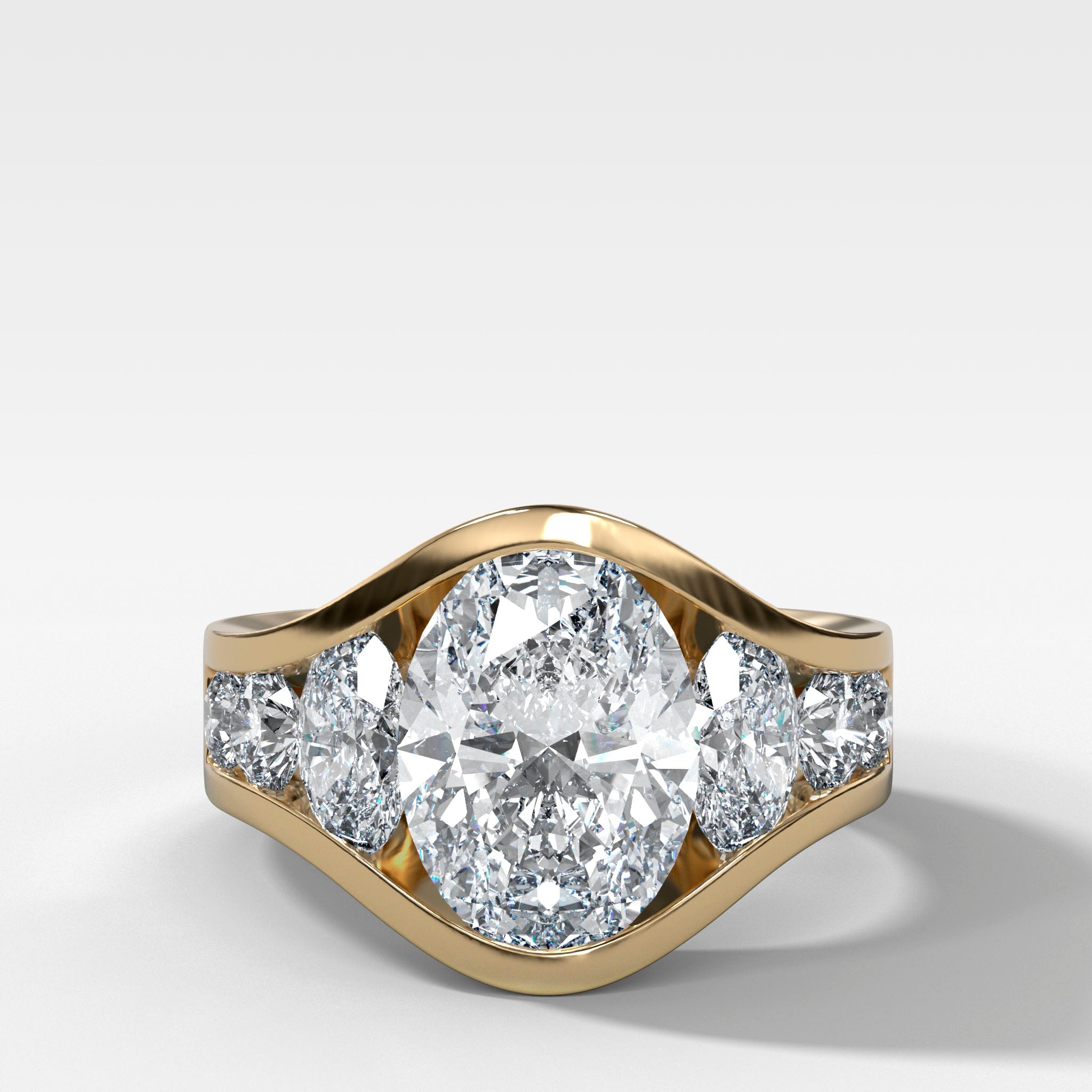Full Channel Set Engagement Ring with Oval and Round Diamonds