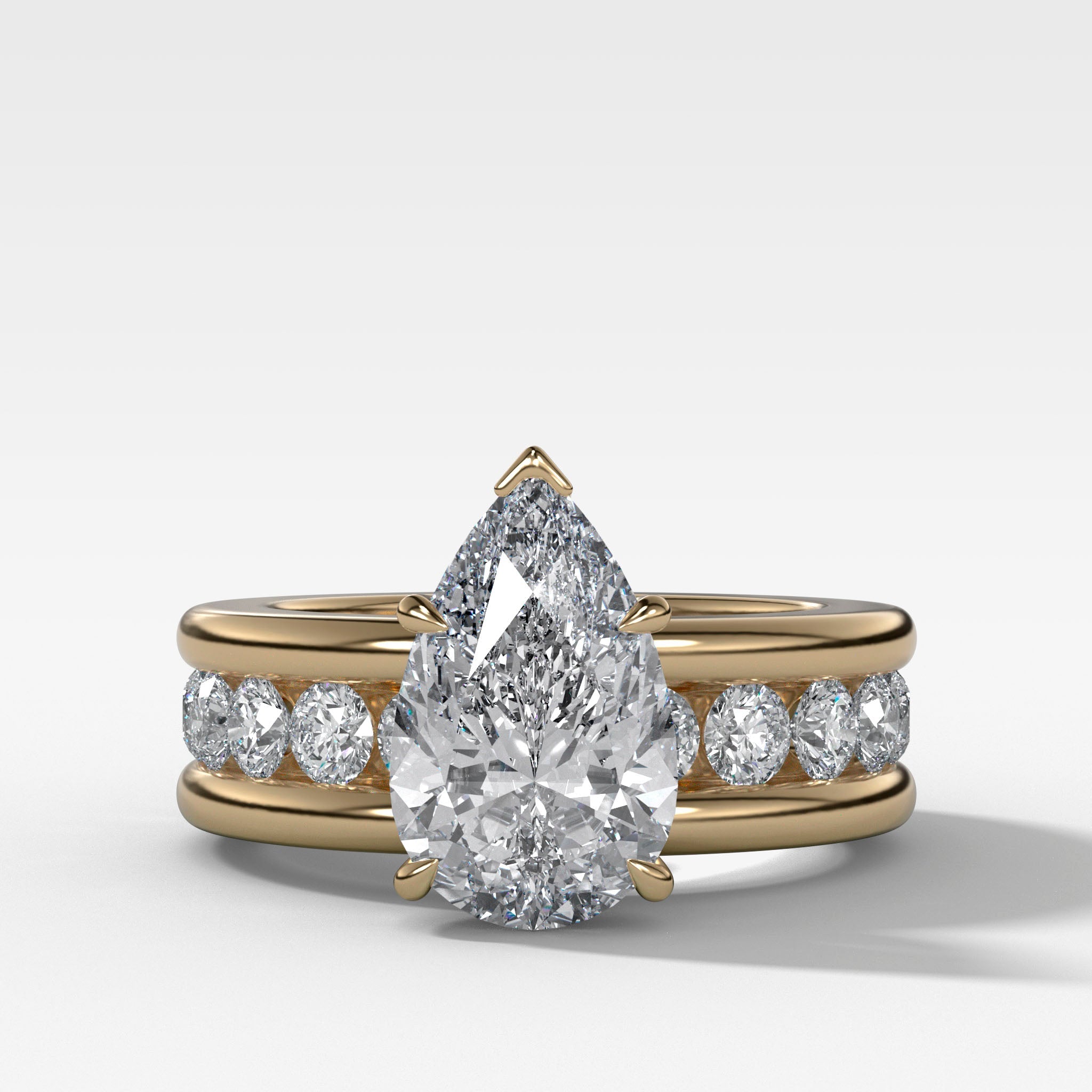 Chunky Channel Set Engagement Ring with Pear Cut Diamond