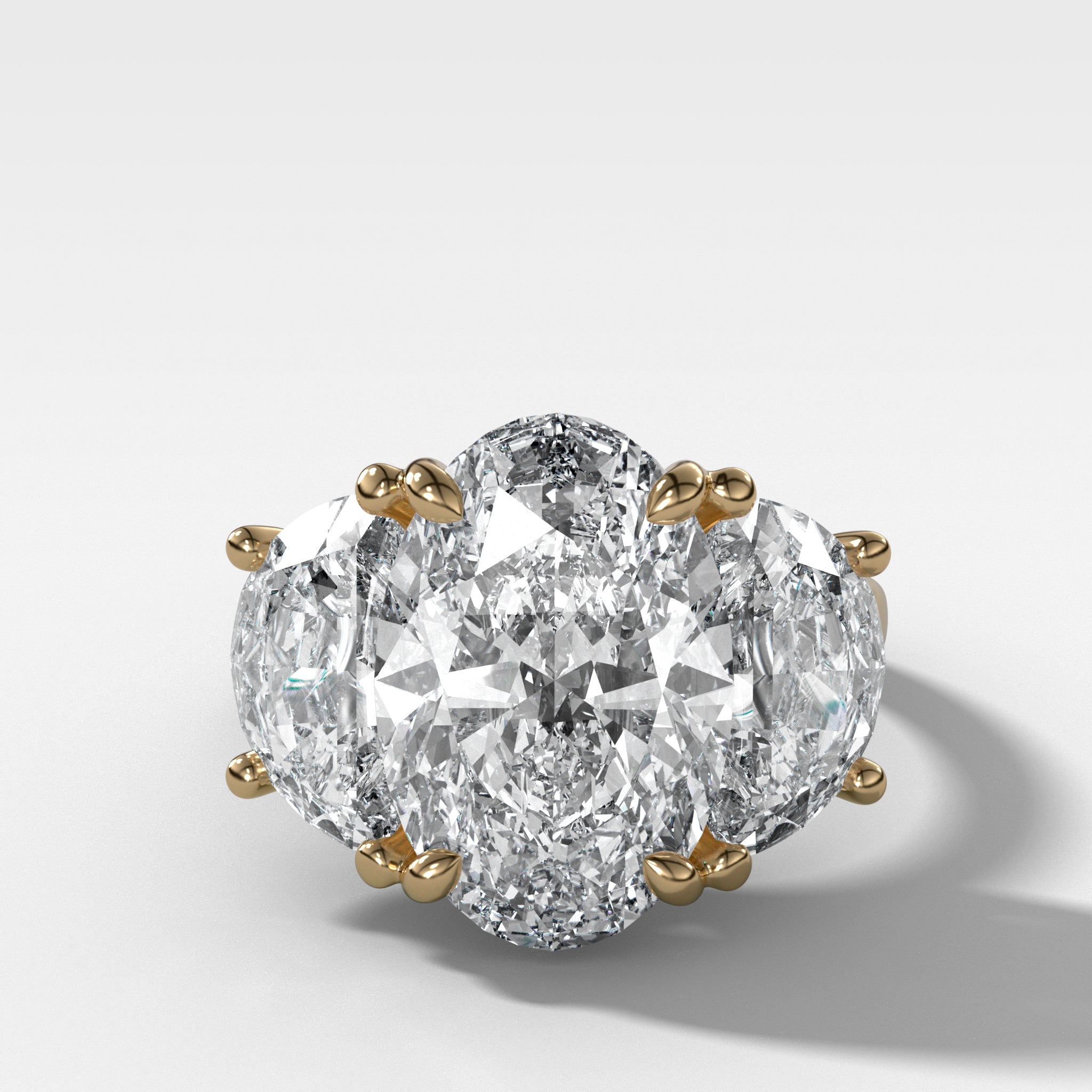 Jumbo Three Stone ring with Half Moon sides & an Oval Cut