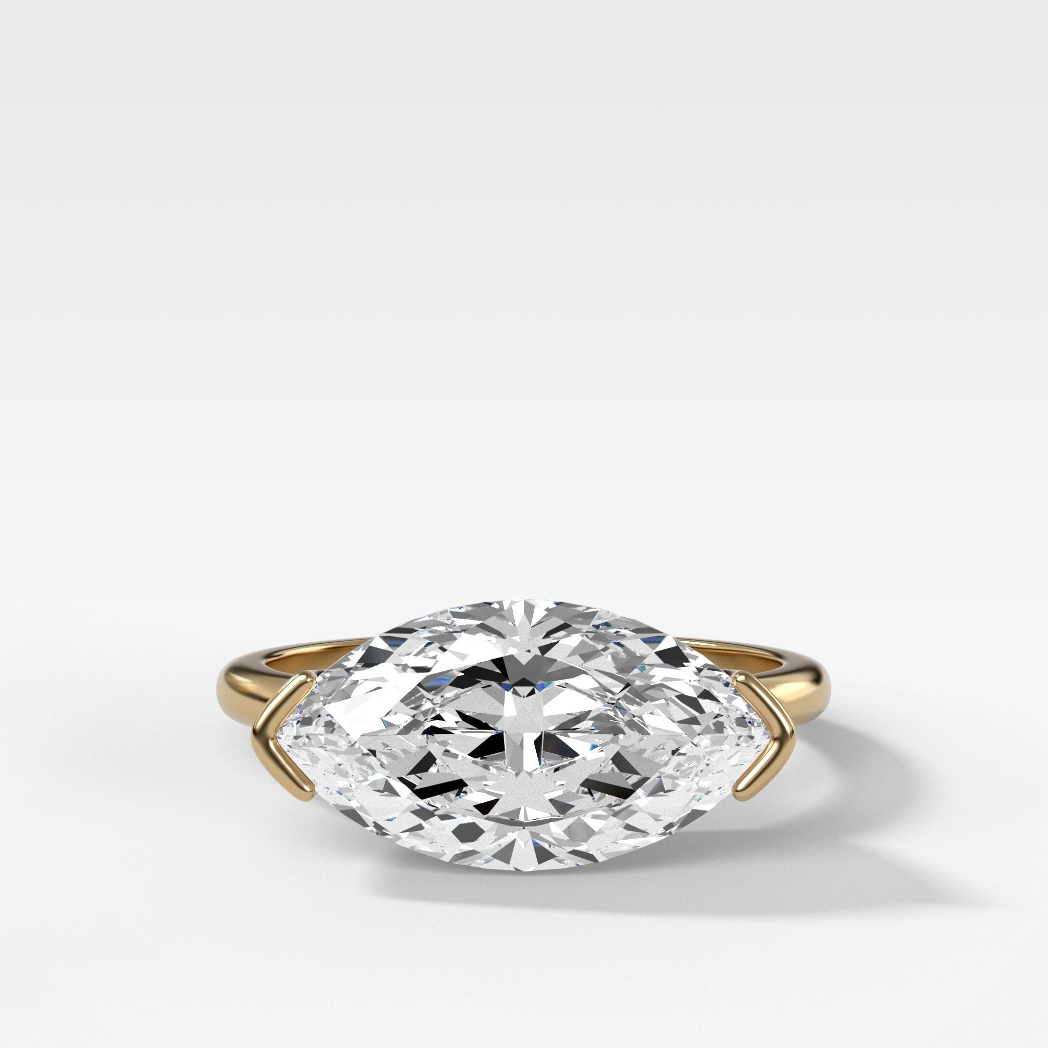 East West Half Bezel Solitaire Engagement Ring With Marquise Cut Diamond