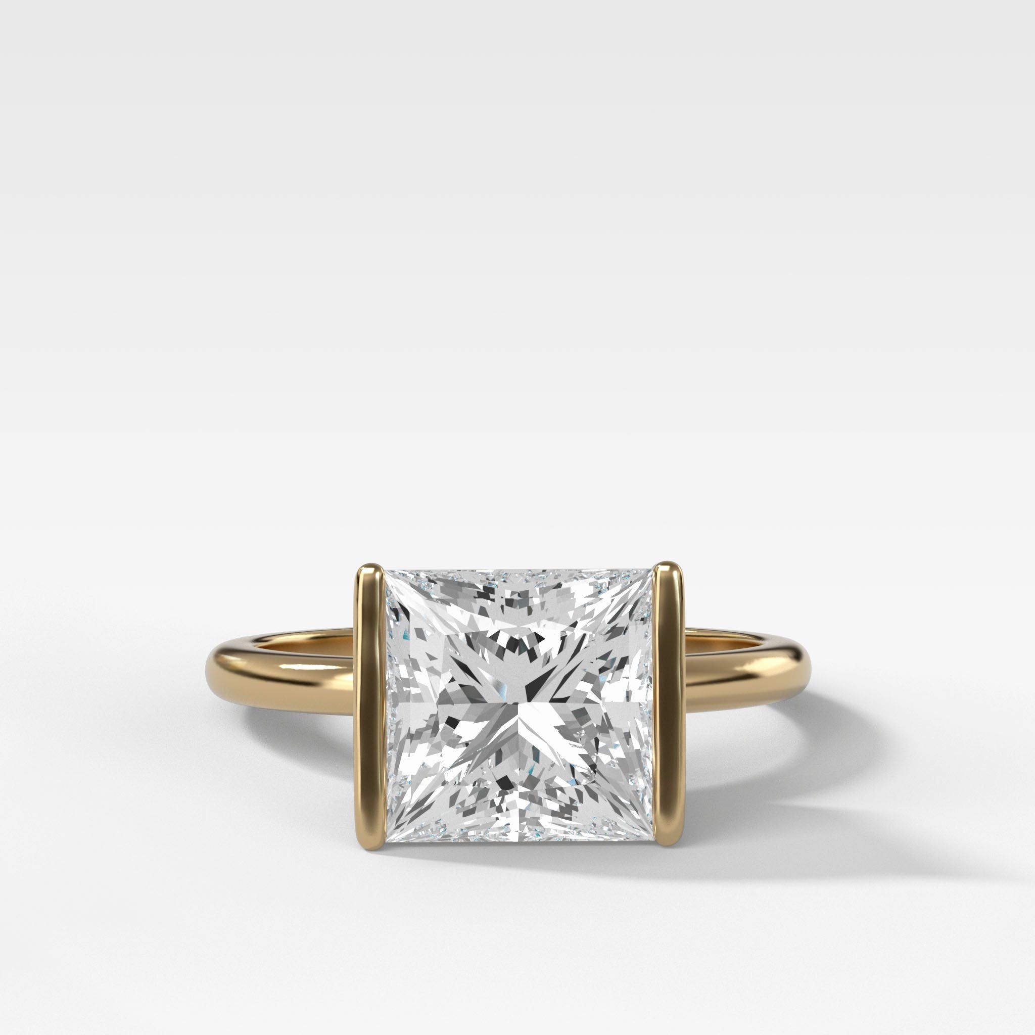 Half Bezel Solitaire Engagement Ring With Princess Cut Diamond
