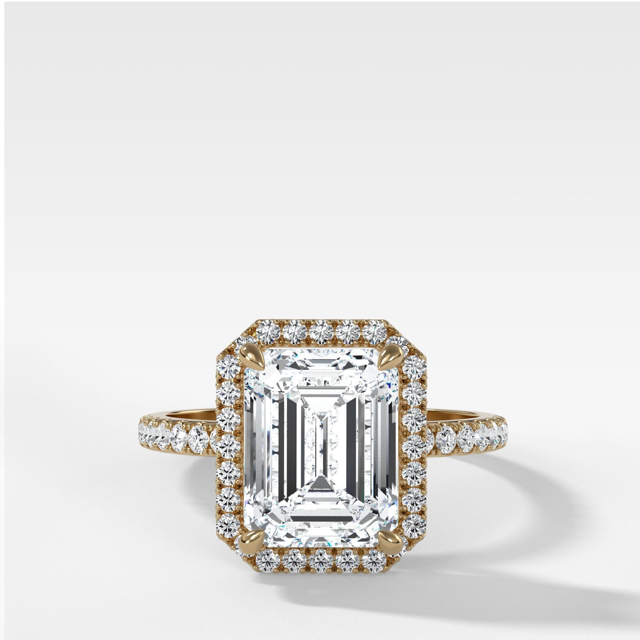 Aurora Pavé Halo Ring With Emerald Cut