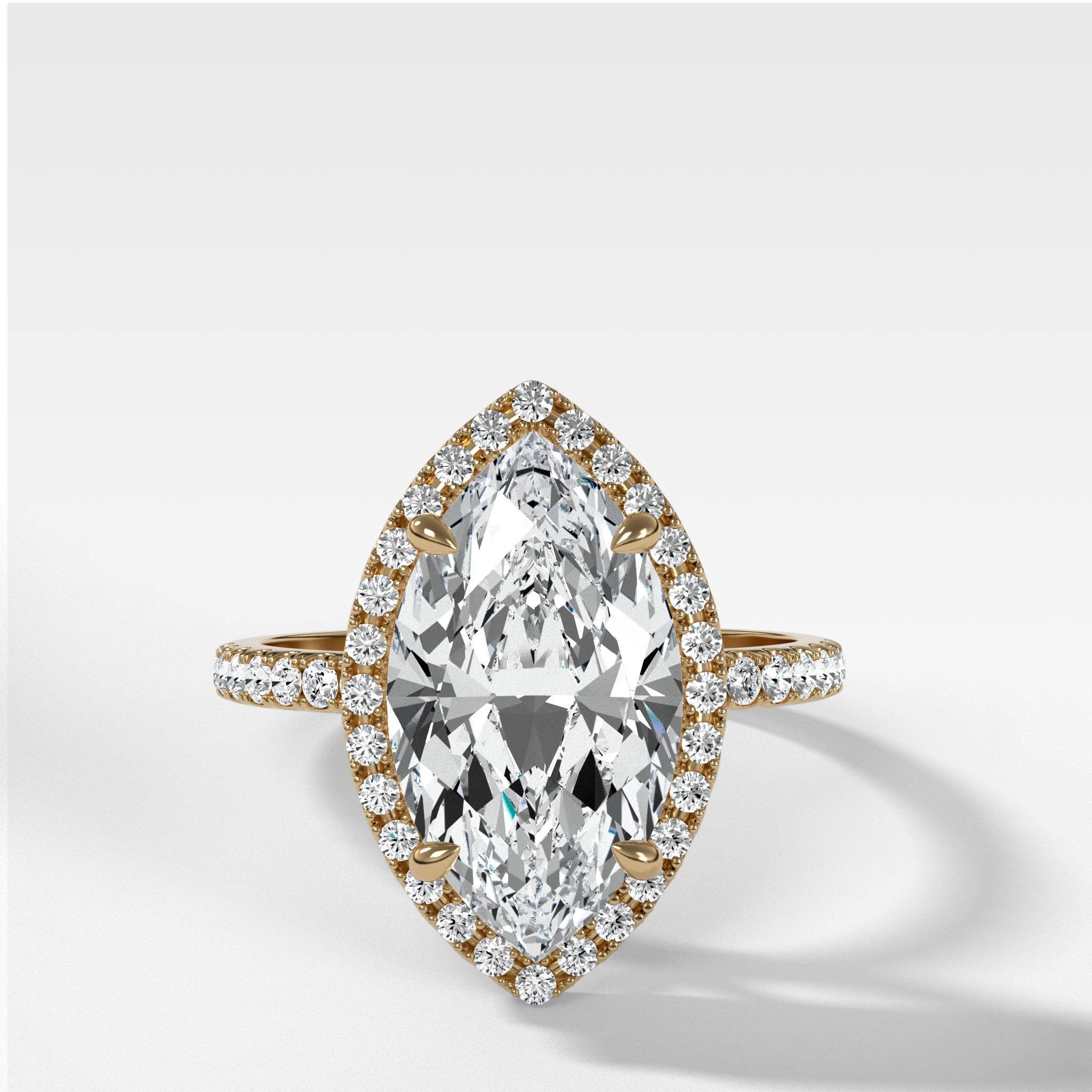 Aurora Pavé Halo Ring With Marquise Cut