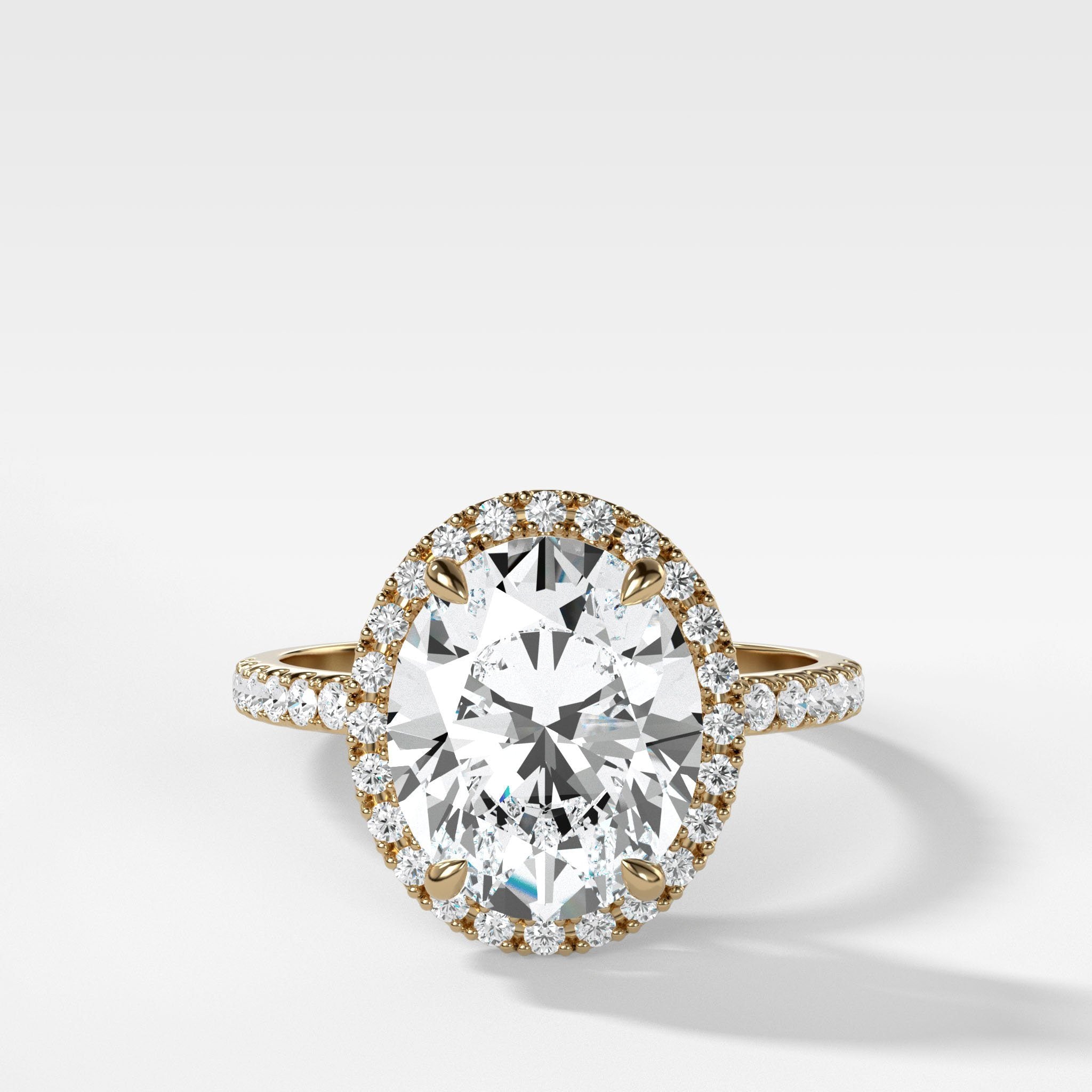 Aurora Pavé Halo Ring With Oval Cut