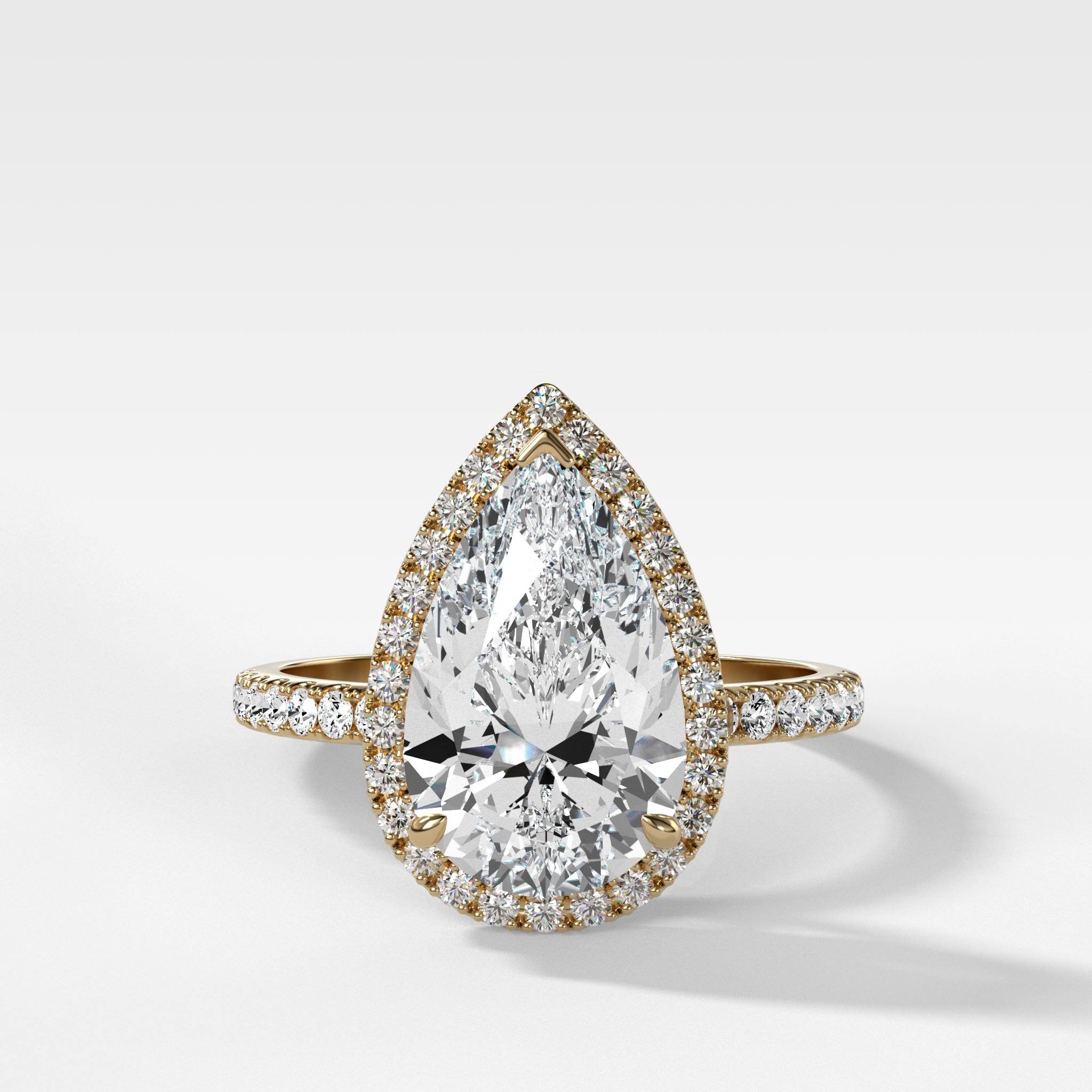Aurora Pavé Halo Ring With Pear Cut